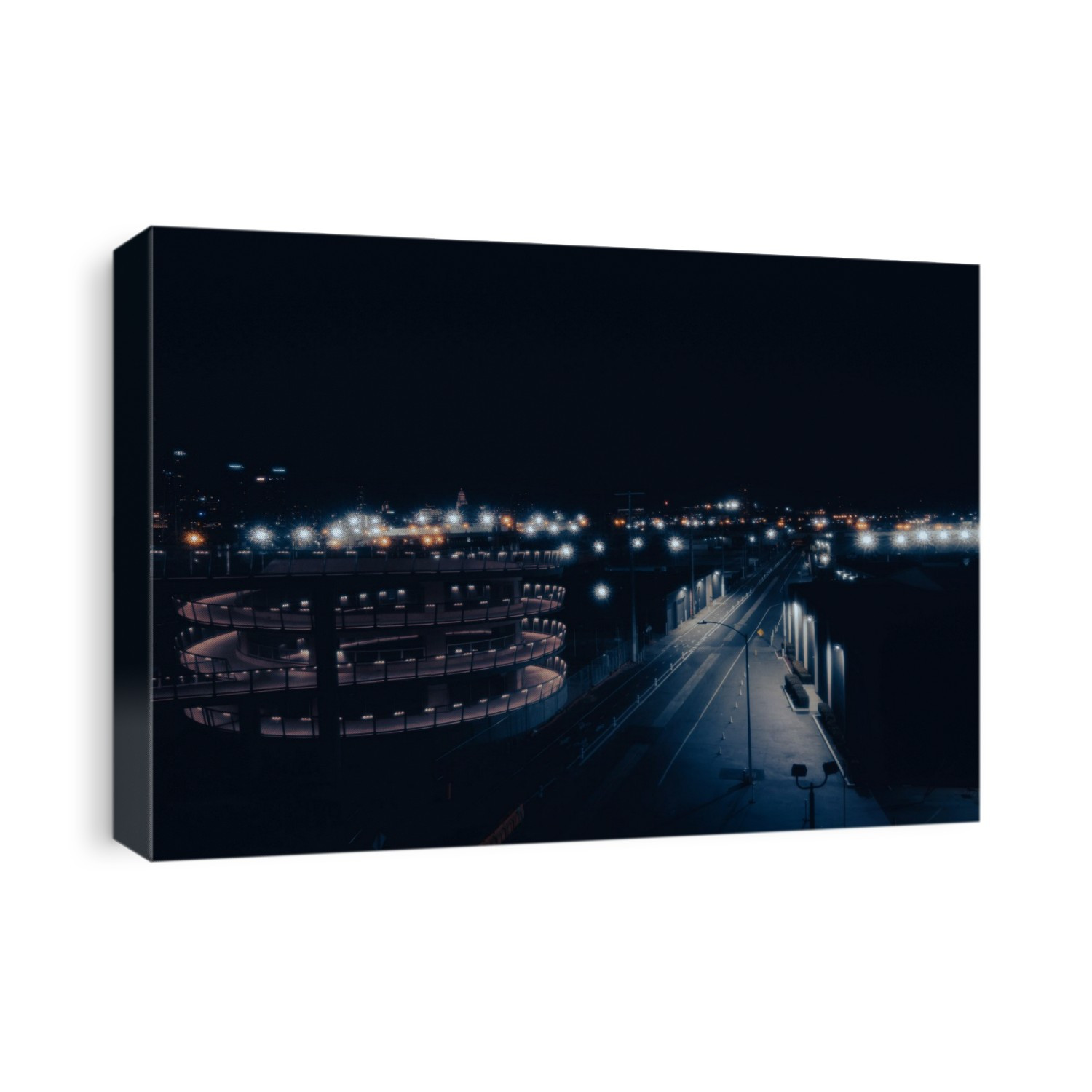 Pedestrian Ramp and street lit up in downtown Los Angeles