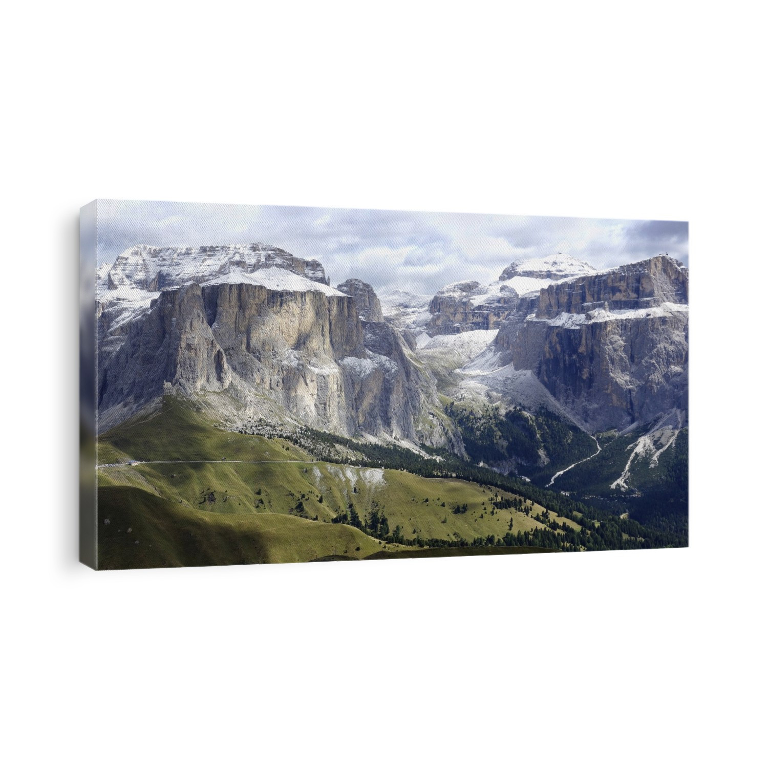Snow-capped mountains, alpine meadows and forested valleys in the Dolomites mountain range, Itlay.