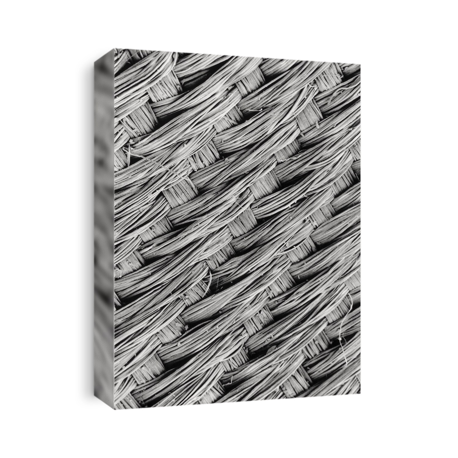 Scanning electron micrograph showing the twill weave pattern on a silk tie. Magnification: x130 (at 10x8 size).