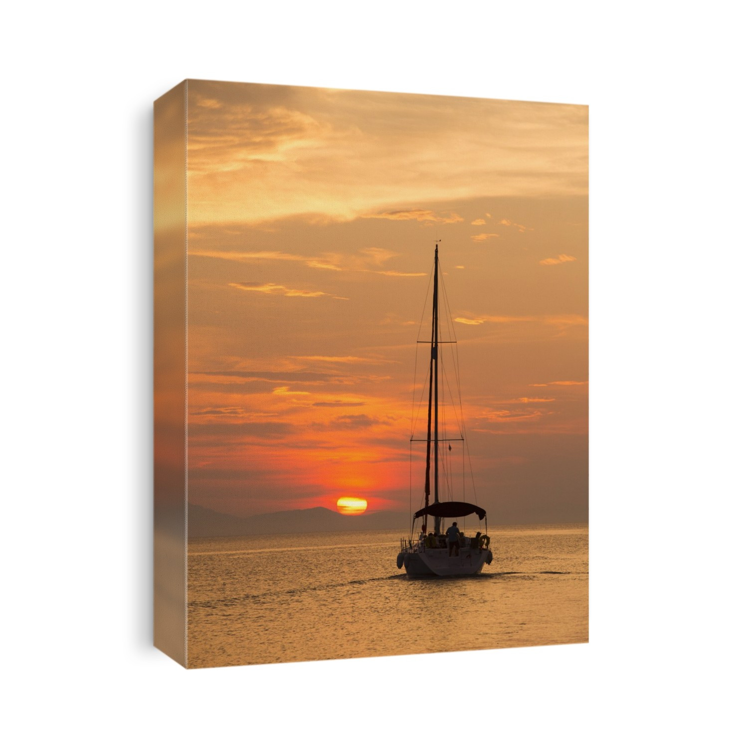 A sailing boat at sunset in front of Corfu, from Sivota, Greece.