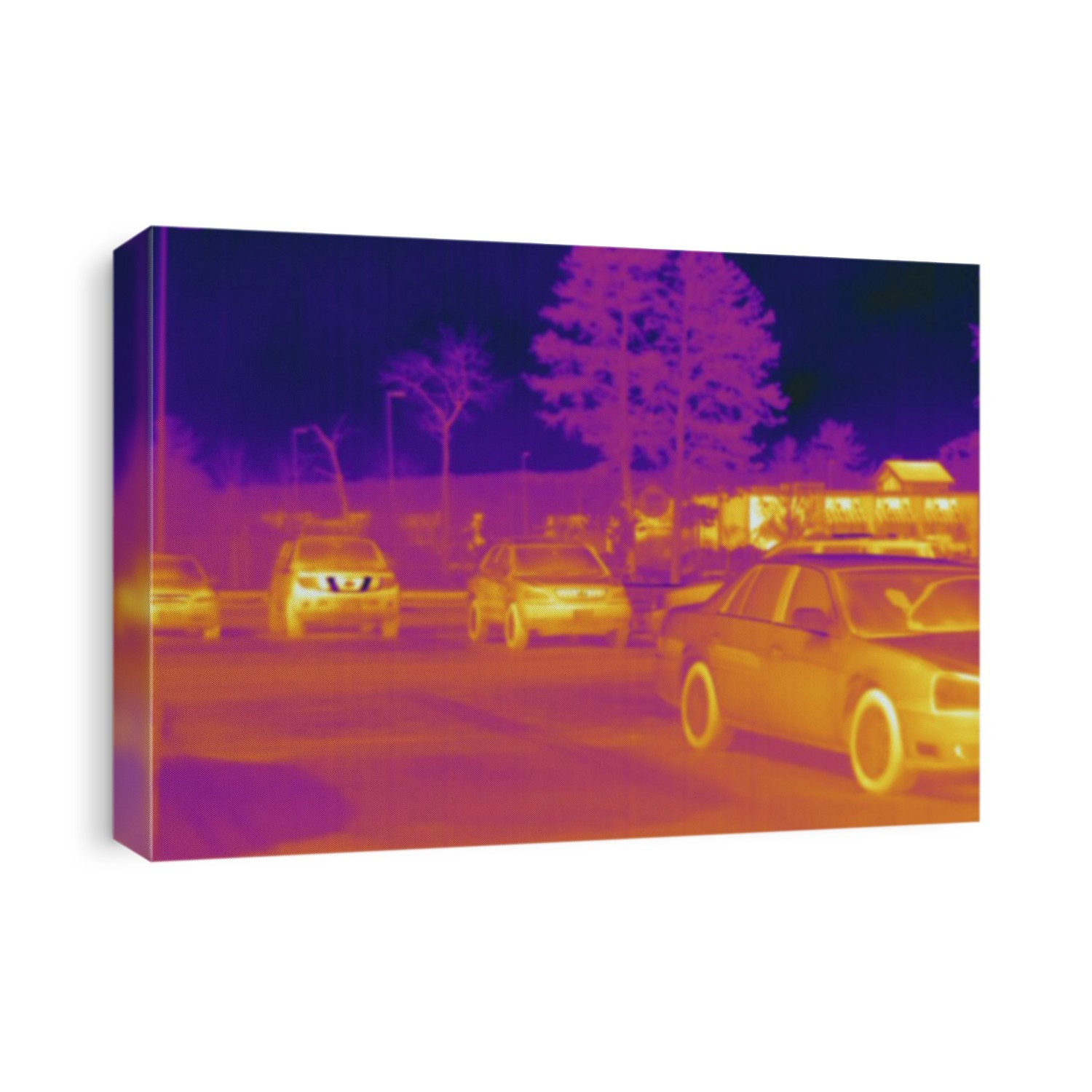 Thermogram - Cars in parking lot - The colors show temperature variation. The temperature scale runs from white (warmest) through yellow, orange, red, purple and black (coldest)