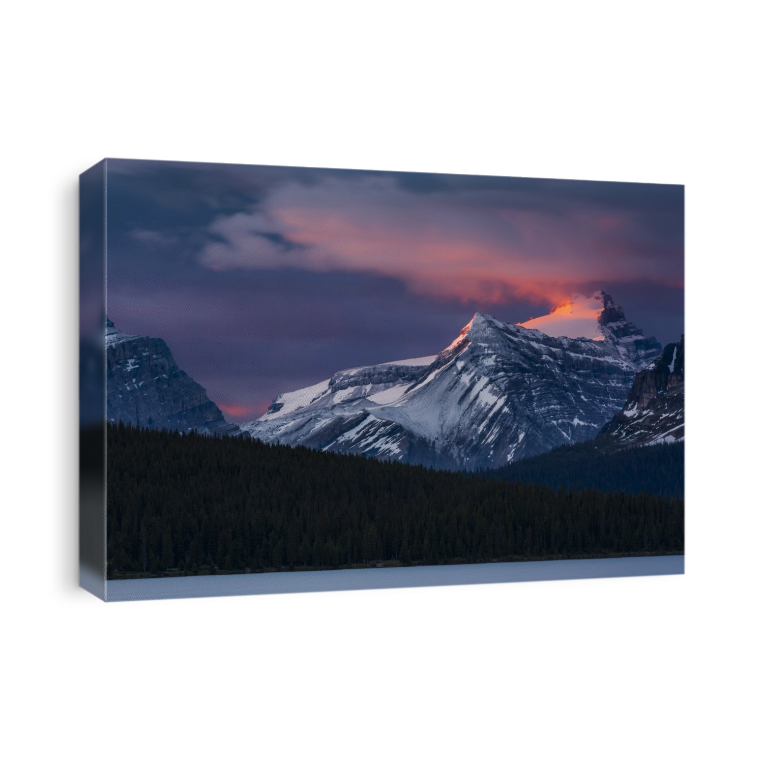 Sunrise illuminating the peaks of the Rocky Mountains over Bow Lake, Banff National Park; Improvement District No. 9, Alberta, Canada