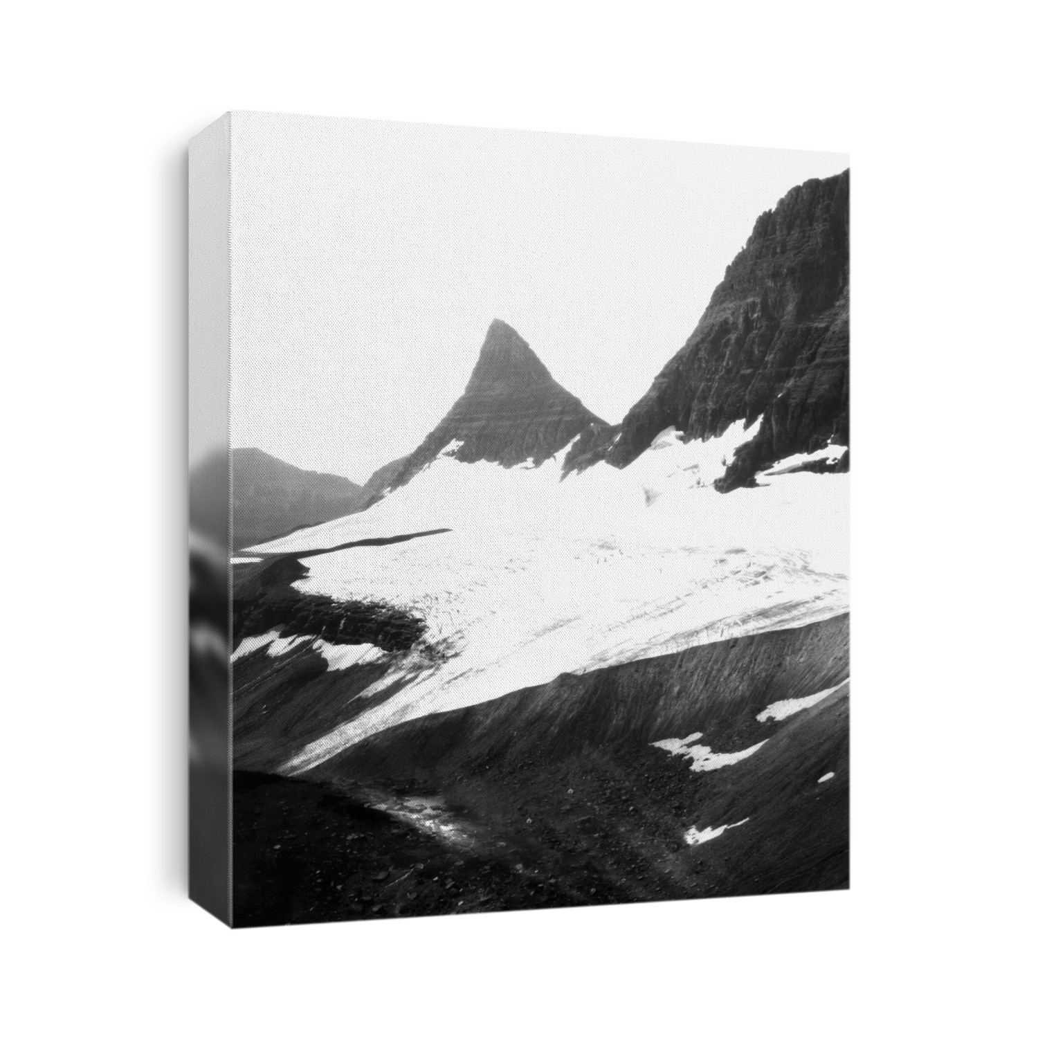 Logan Glacier, 1914. Image 1 of 2. Logan Glacier is located at Glacier National Park, Montana, USA. This photograph, taken in 1914, shows the glacier across much of the middle of the image. Glaciers are large, slow-moving expanses of ice, formed from compacted layers of snow. They are sensitive to climate change and in recent years most have retreated dramatically. See image C014/5528 for an image of the same glacier as seen in 2009.