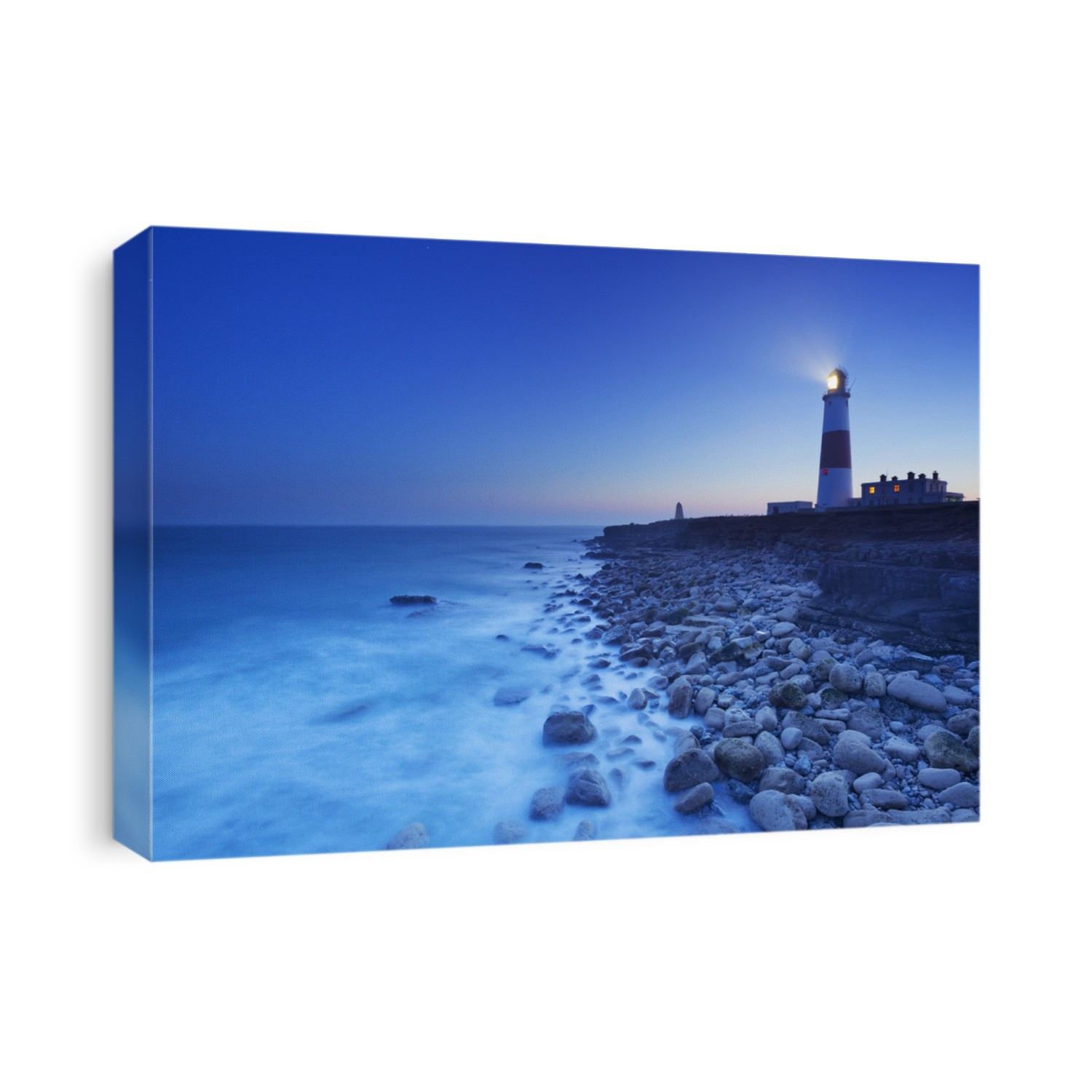 The Portland Bill Lighthouse on the Isle of Portland in Dorset, England at night.
