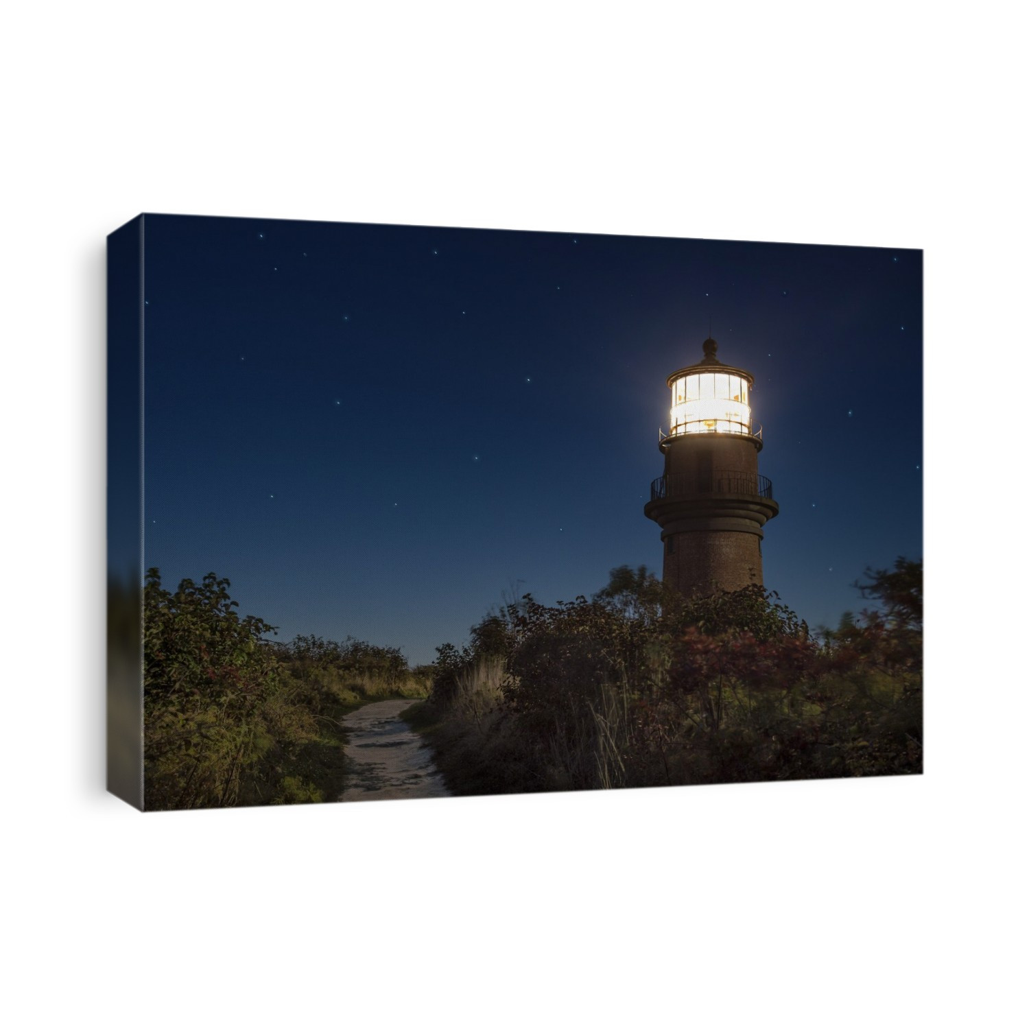 Gay Head Light. View of Gay Head Light, Gay Head, Aquinnah, Martha's Vineyard, Massachusetts, USA, lit up at night. This lighthouse was originally constructed with a wooden tower in 1799. However this was replaced with the current conical brick tower, which was first lit in 1856.