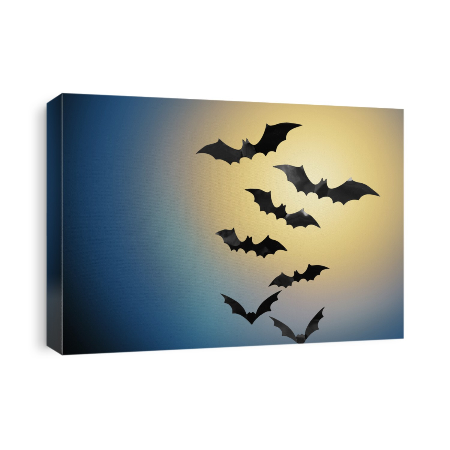 halloween and scary concept - black bats flying in moonlight over night sky background