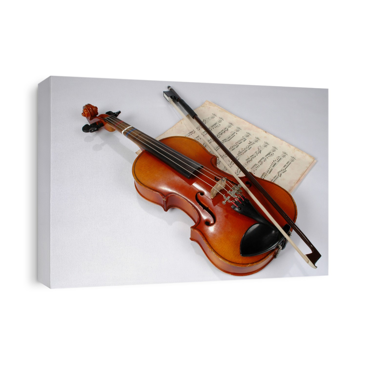 Old violin with vintage music sheet