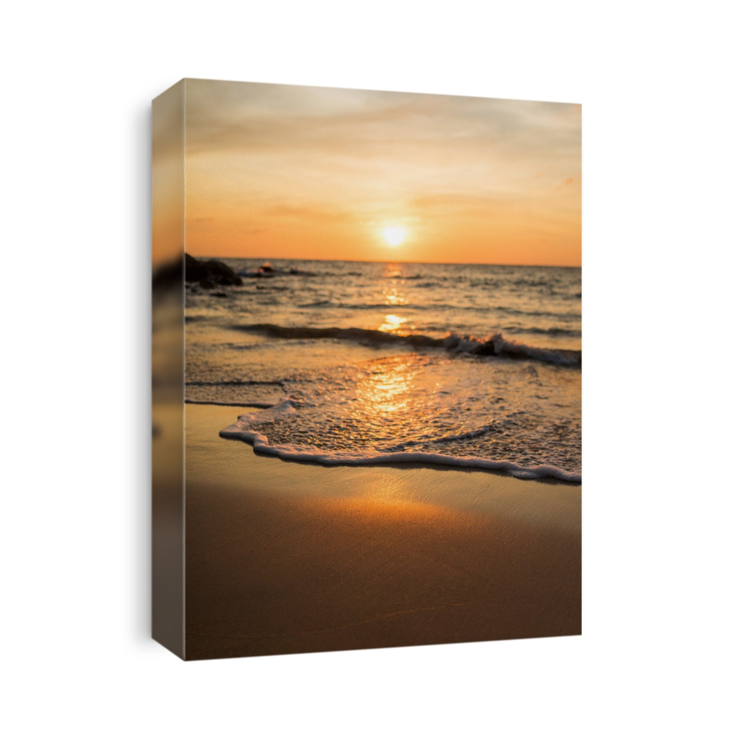 orange sunset on a beach with wave