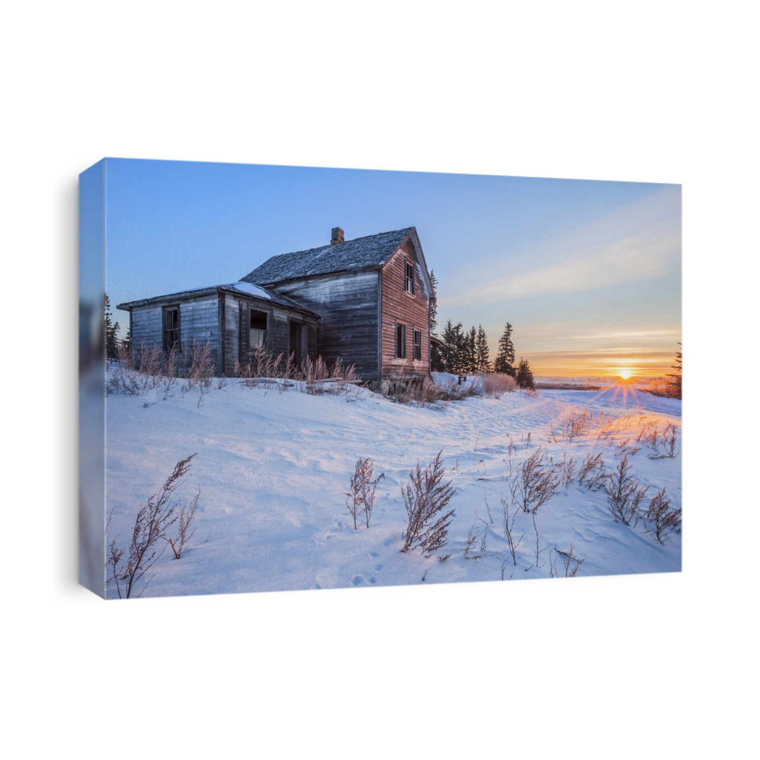 Dilapidated farm house at sunrise in winter, near Winnipeg; Manitoba, Canada