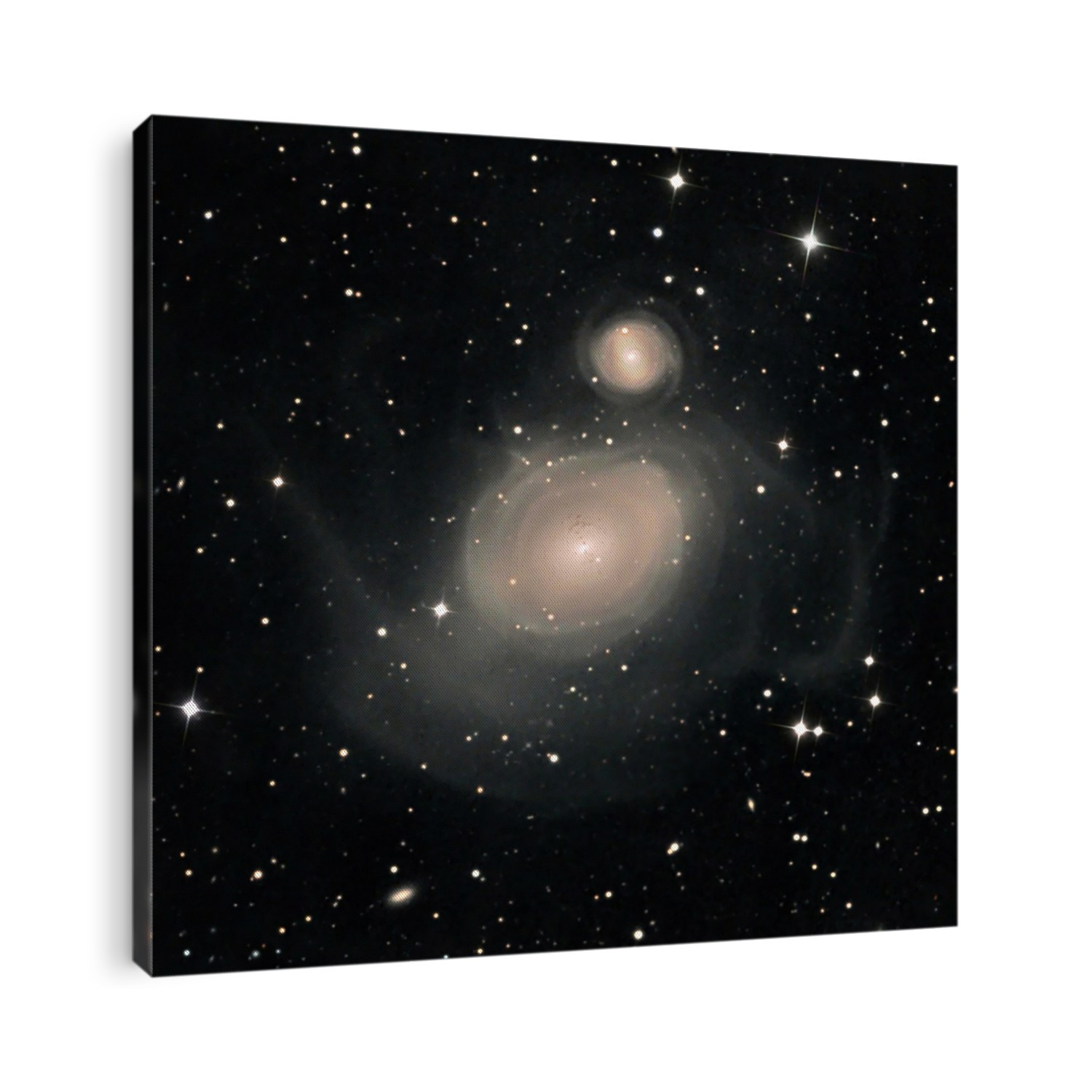 Spiral galaxy NGC 1316, also known as Fornax A. This lenticular galaxy is seen with the smaller galaxy NGC 1317 above it. Fornax A is a powerful source of radio waves. Part of the Fornax Cluster, it is around 70 million light years from Earth in the constellation of Fornax. Image obtained on 28 July 2015.