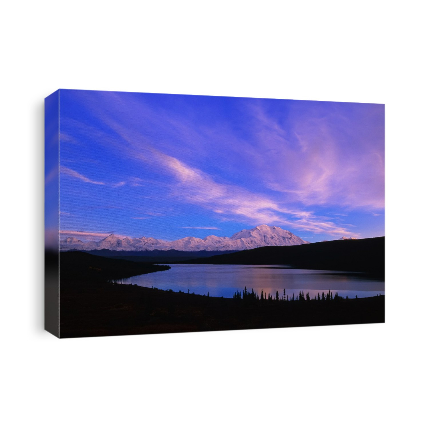Mount McKinley and Alaska Range reflected in Wonder Lake at sunrise; Alaska, United States of America