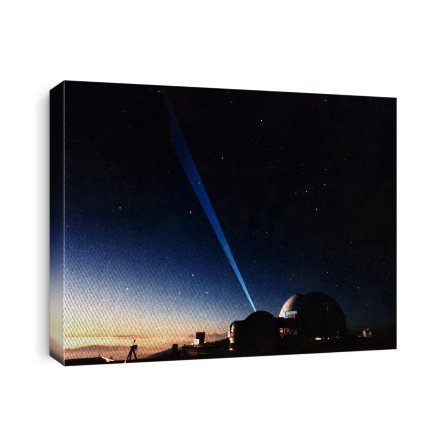 A ground-based, low-power laser beam is fired into the night-sky to track a Terrier-Malemute sounding rocket launched from a U. S. base in Hawaii. The laser beam appears as a blue fan in this time- lapse photograph; observatory domes at the Maui Air Force base appear at bottom. The aim of the experiment was to veryify atmospheric correction of the laser beam, as part of series of tests on the viability of targeting ground- based lasers against hostile ballistic missiles in space - one of the objectives of the US Government's Strategic Defense Initiative, the so-called Star Wars program.