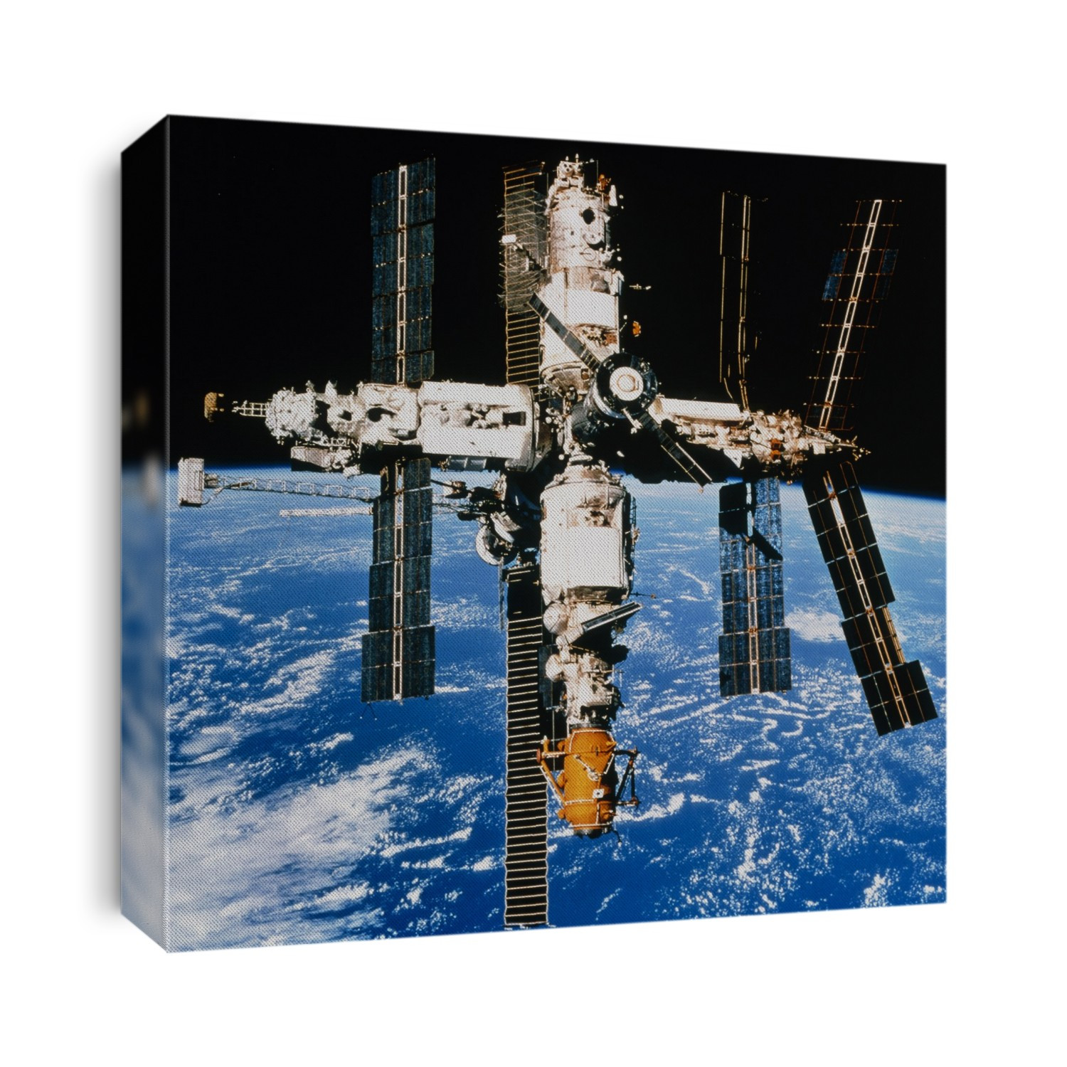 Mir space station. View of the Russian space station Mir ('peace') in orbit over the Earth. Mir was launched in February 1986. The space station originally consisted of a core module and docking facilities. Subsequent launches have added a variety of science modules, increasing the space station's mass from its original 21 tonnes to over 100 tonnes. This photograph was taken from Space Shuttle Endeavour which docked with Mir during Mission STS-89, which took place between 22 and 31 January 1998. During the mission, Endeavour took guest astronaut David A. Wolf from Mir, leaving Andrew S. W. Thomas on board. The shuttle docked via the special module at lower centre (orange).