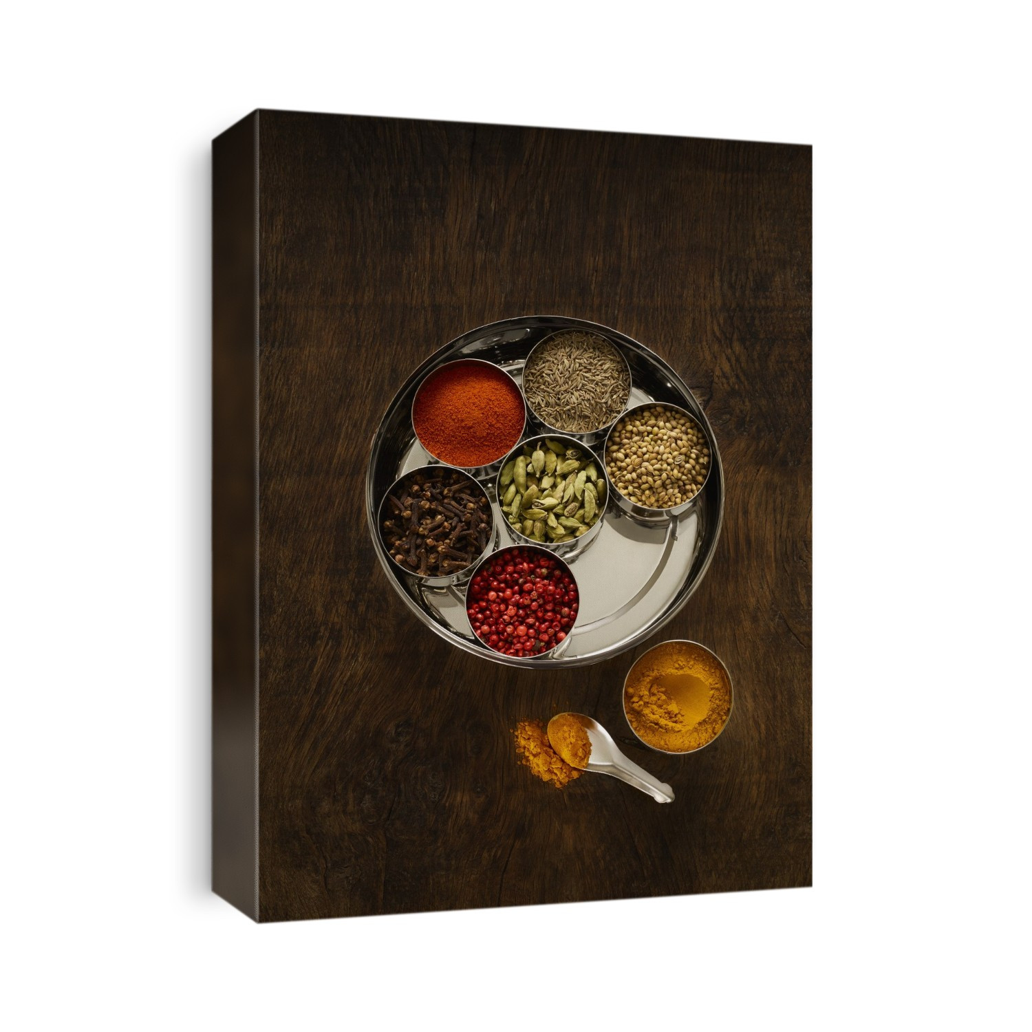 Selection of dried spices in dishes, studio shot.