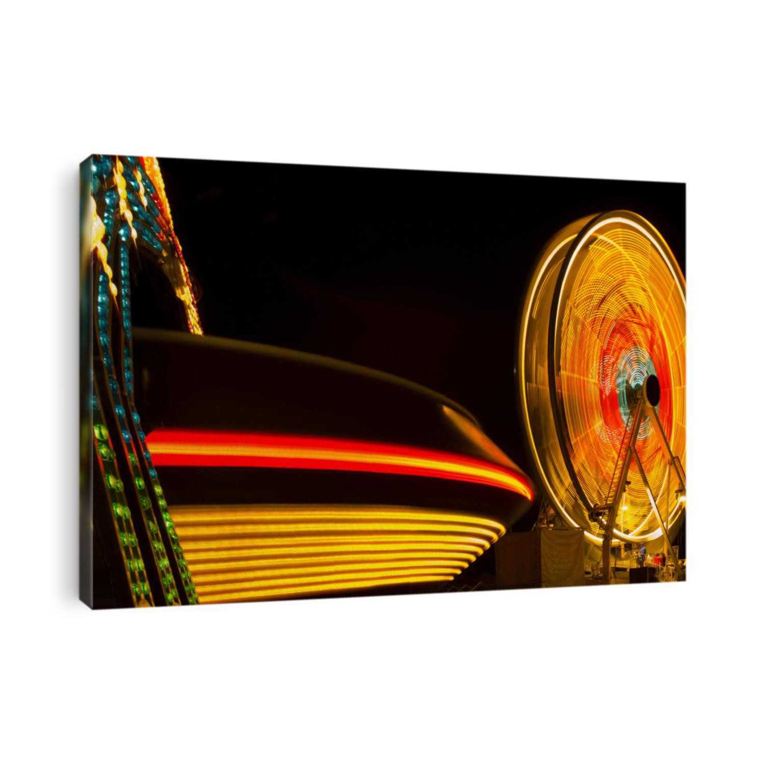 Multicolor carnival rides in motion