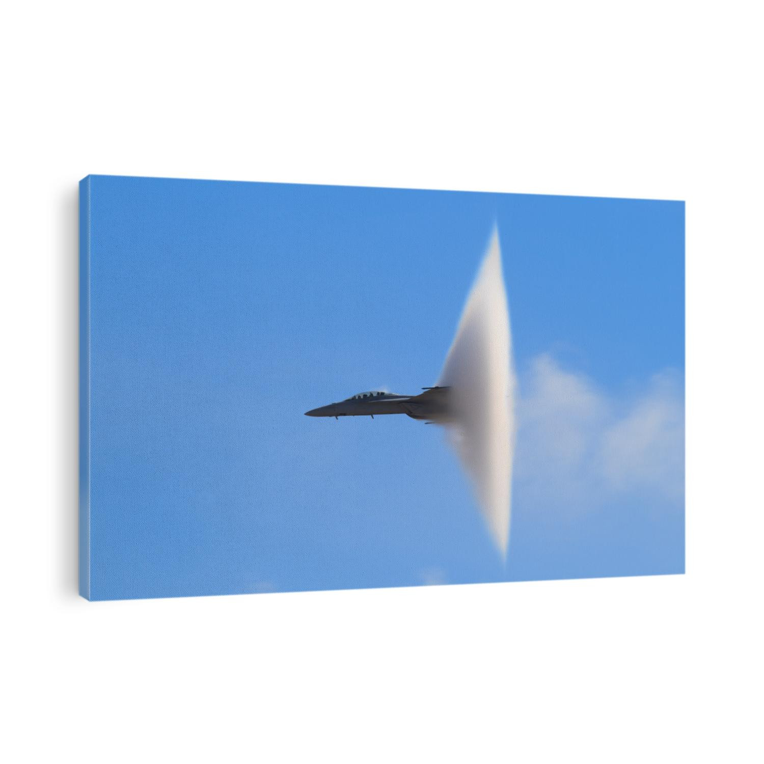 F-18 Super Hornet Vapor Cone - A distinctive vapor cone forms around the jet as it nears the speed of sound, otherwise known as the Prandtl-Glauert Singularity.