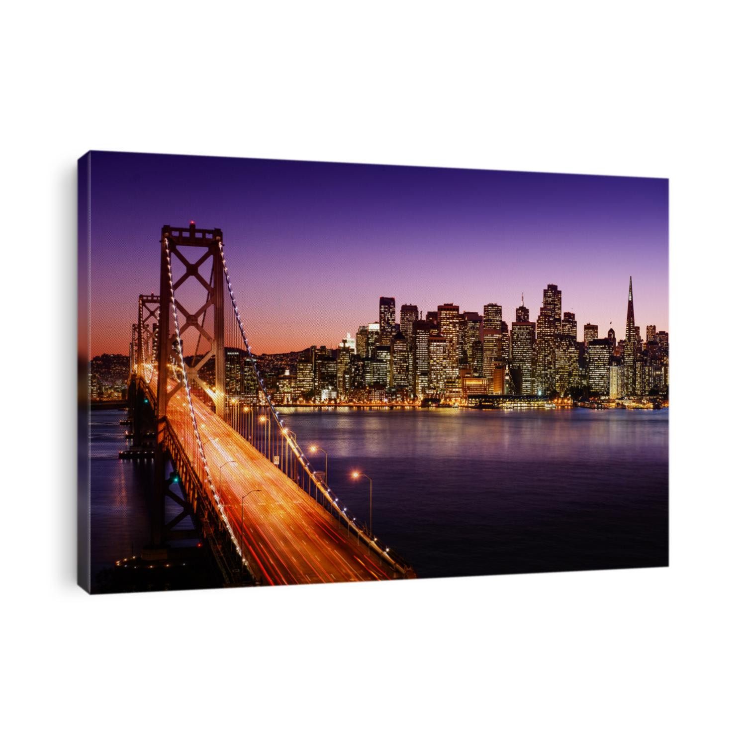 San Francisco skyline and Bay Bridge at sunset, California