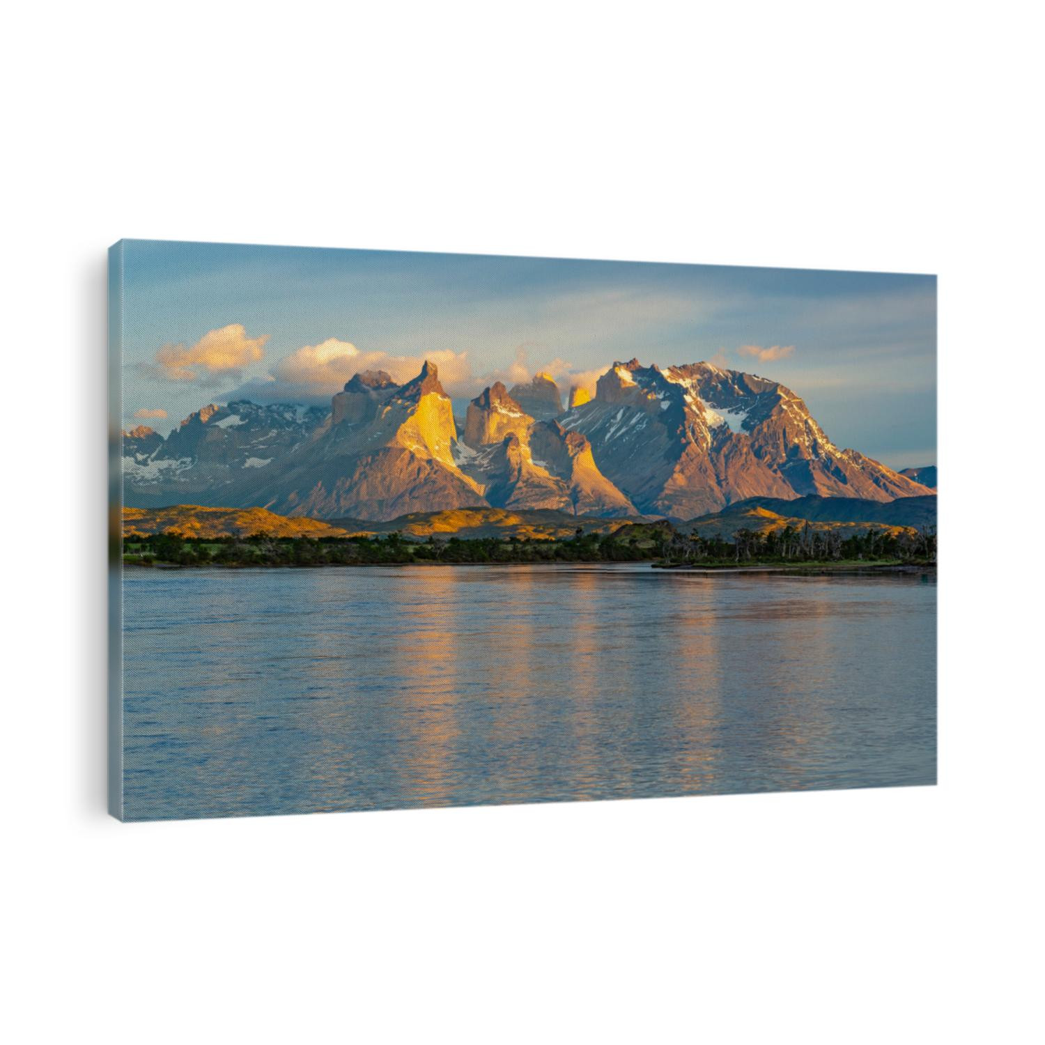 The Cuernos and Torres del Paine at sunrise by the Serrano River inside Torres del Pine national park, Patagonia, Chile.
