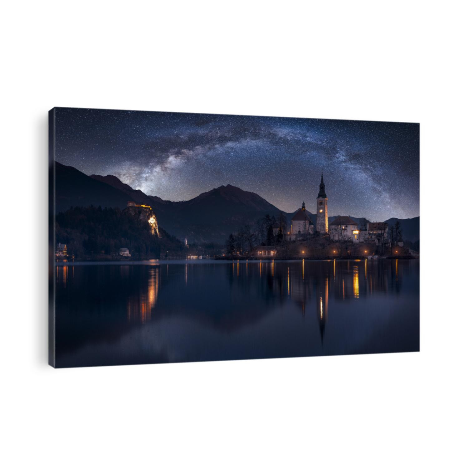 Slovenia Bled Island, Village and Castle Panorama Skyline framed at Night with Milky Way and Water Reflection
