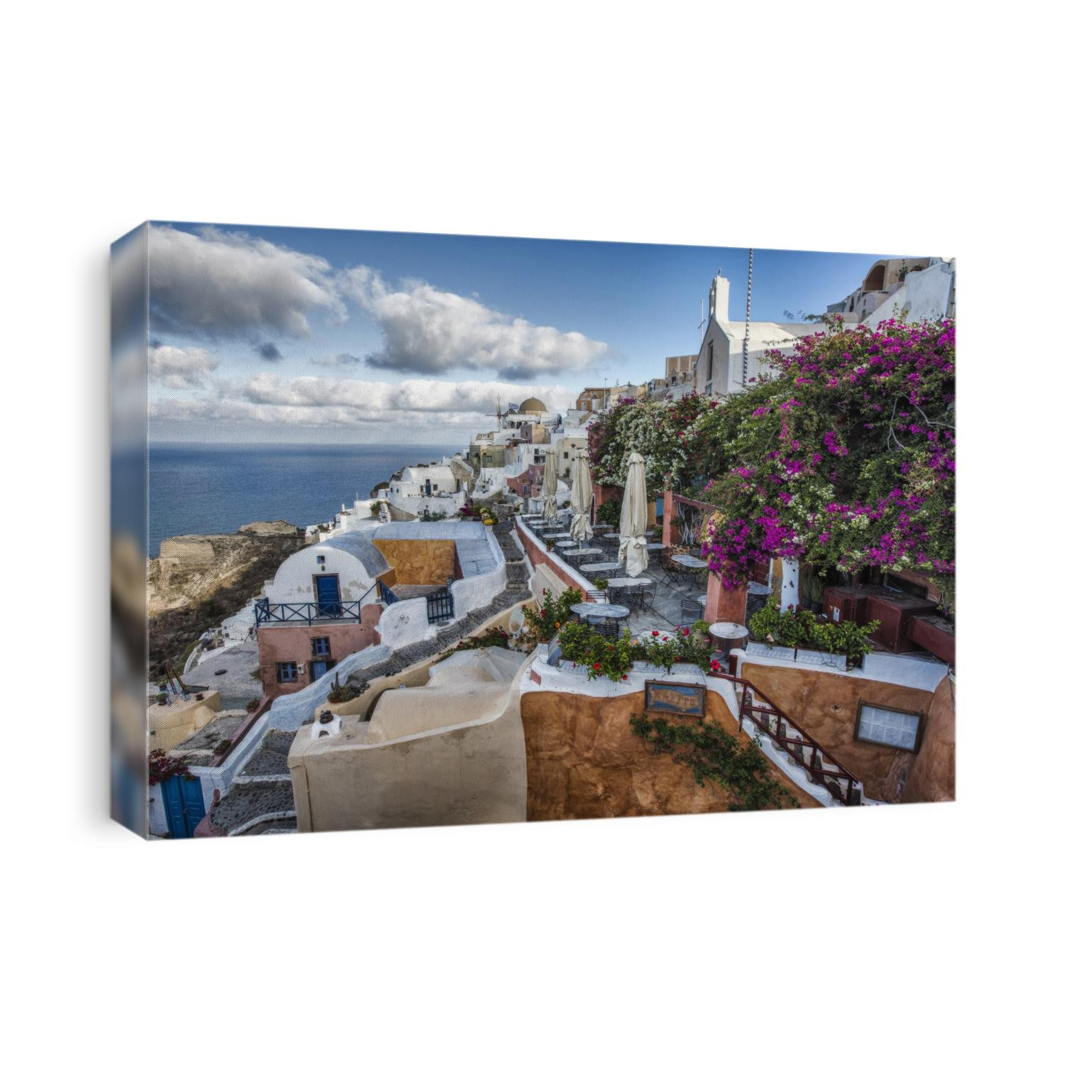 Bouganvillea and cafes on Oia, Santorini