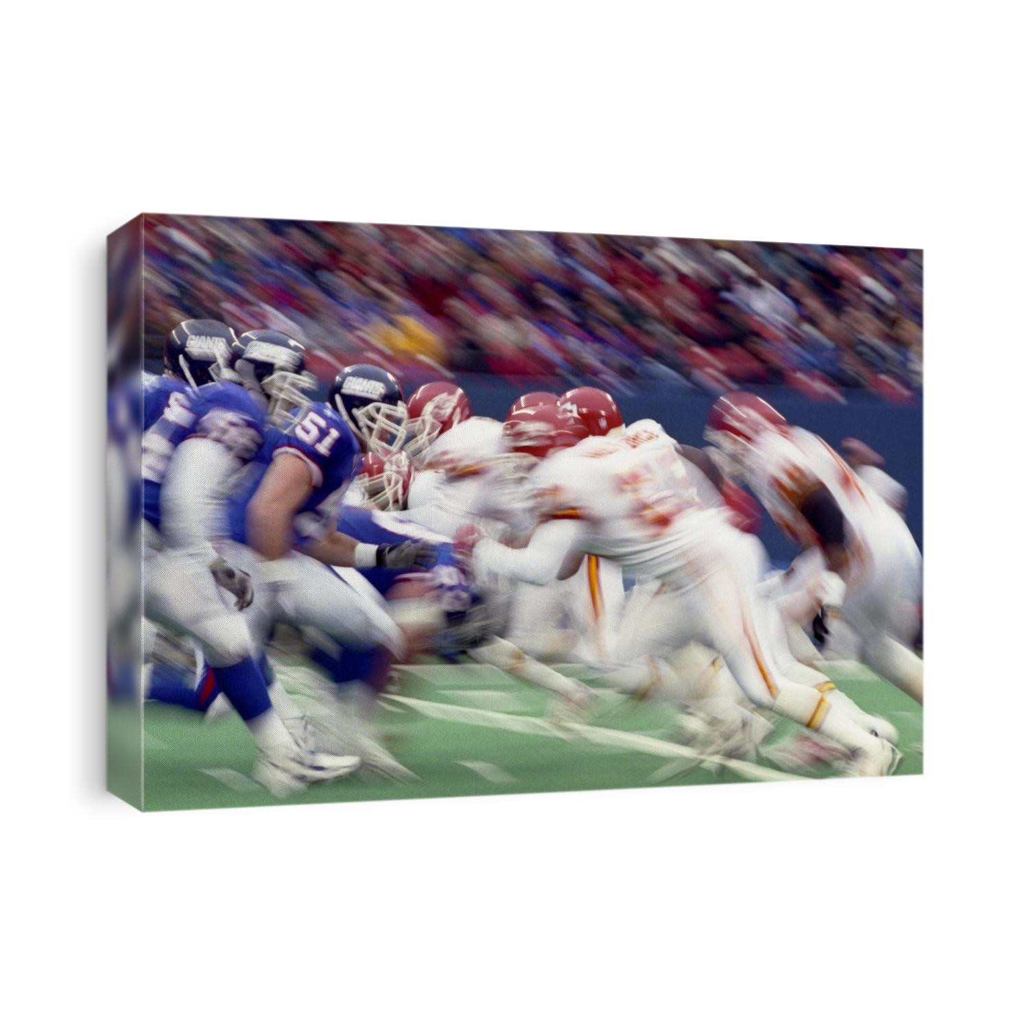 Blurred action of NFl football-NY Giants vs. KC Chiefs.