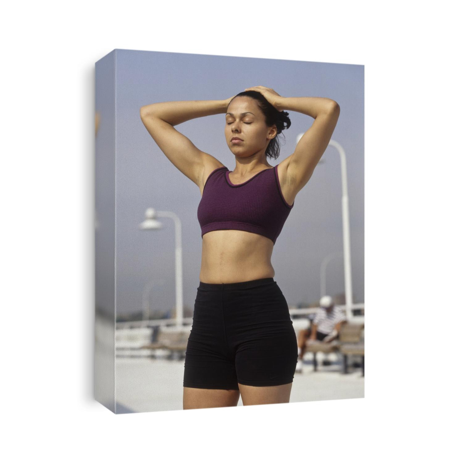 Woman stretching outdoors.