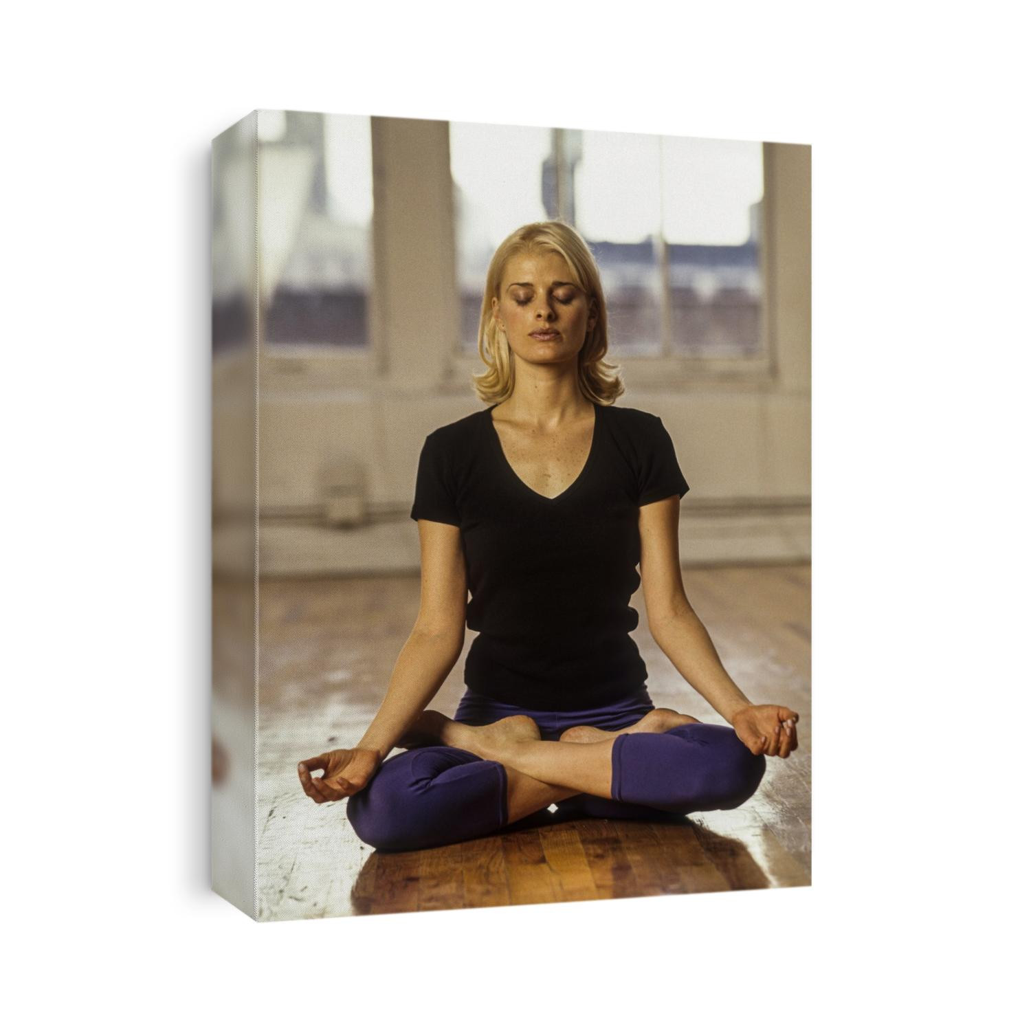 Young woman in yoga position.