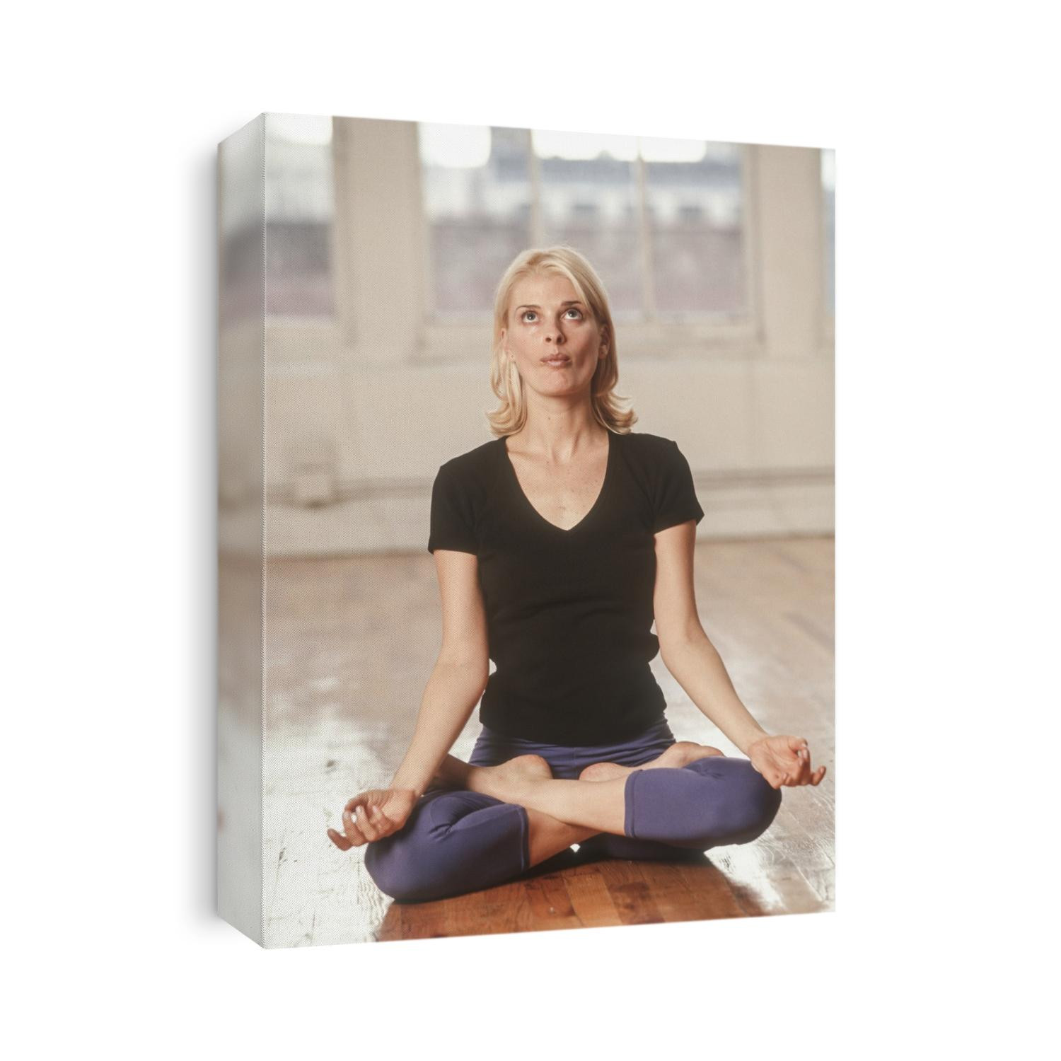 Young woman in yoga position.
