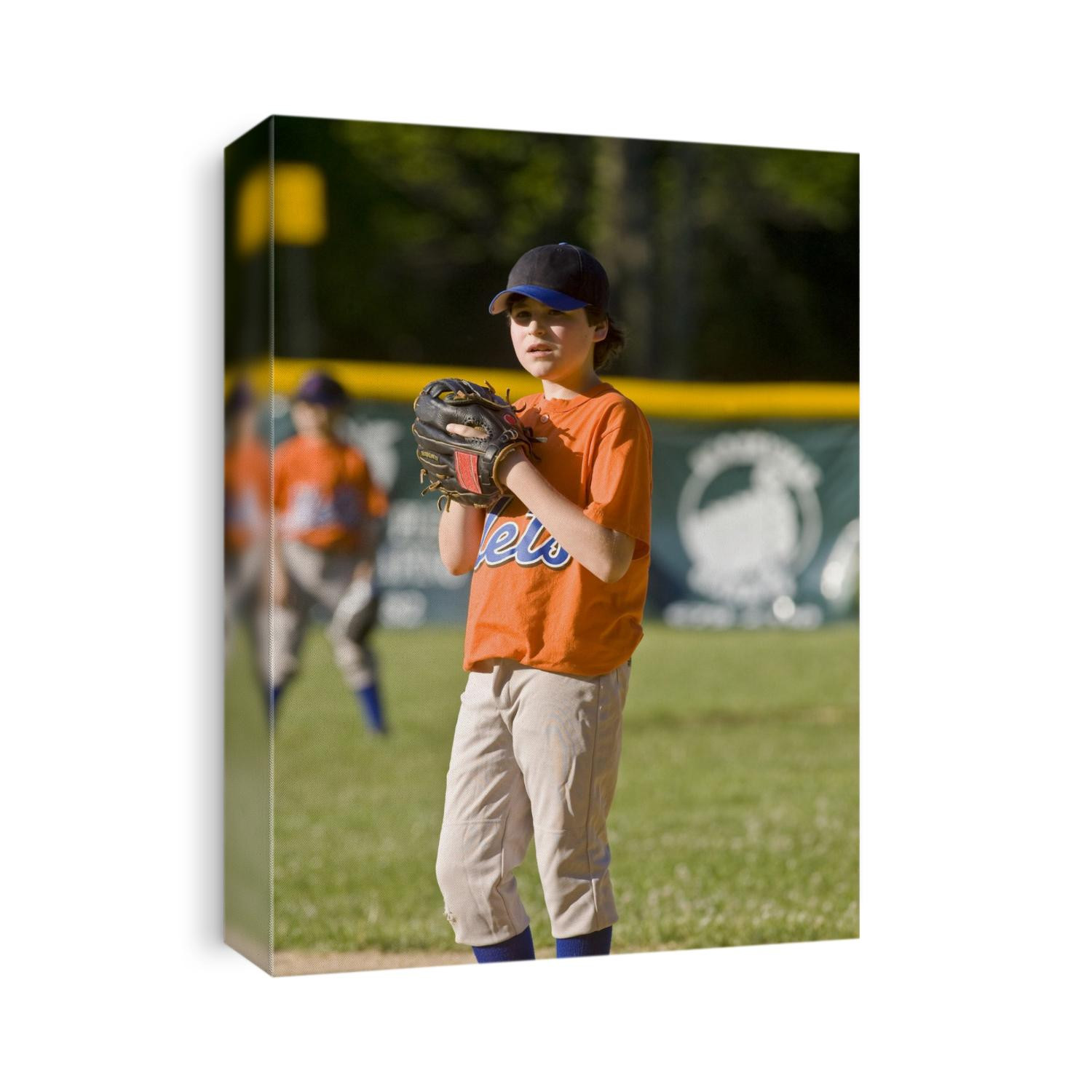 Boys baseball game action.