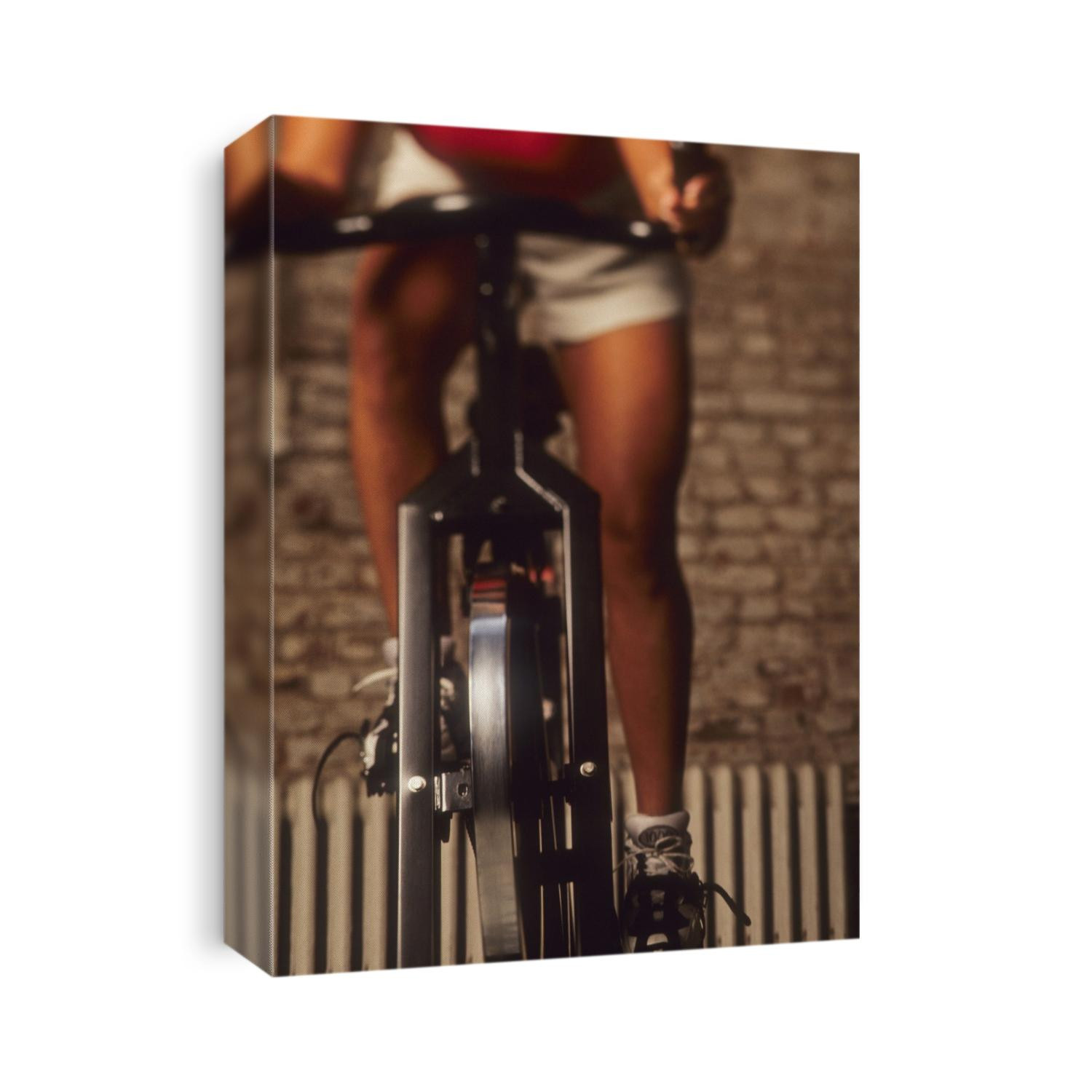 Woman exercising on a stationary bike.