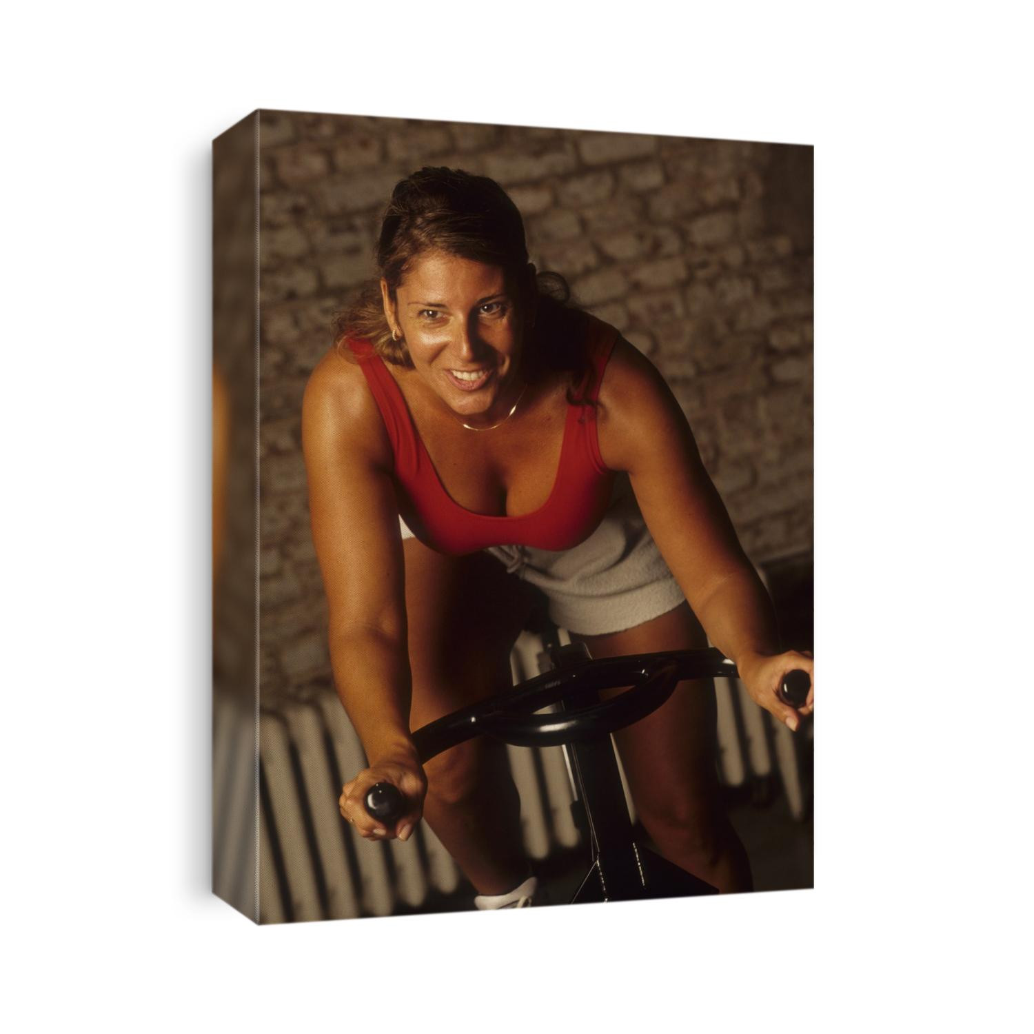 Woman exercising on a stationary bike.