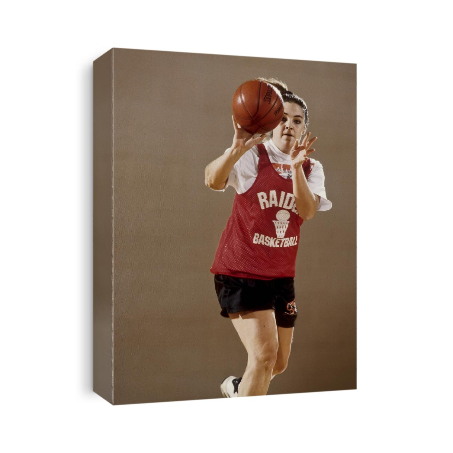 Girls High School basketball player during training session.