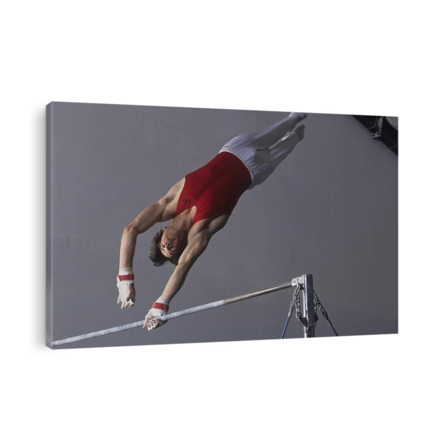 Male gymnast on the horizontal bar.