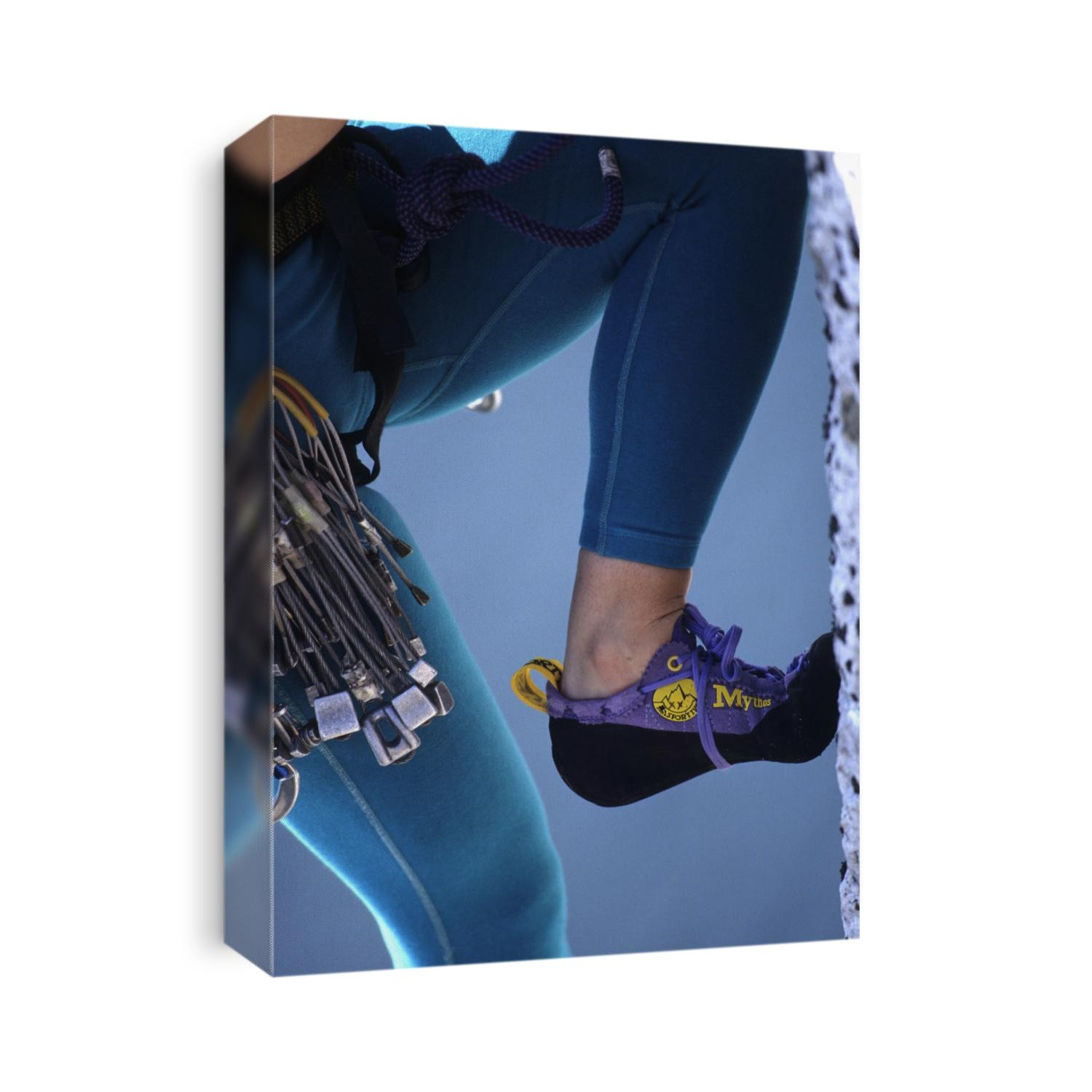 Woman rock climber shoe and legs(detail).