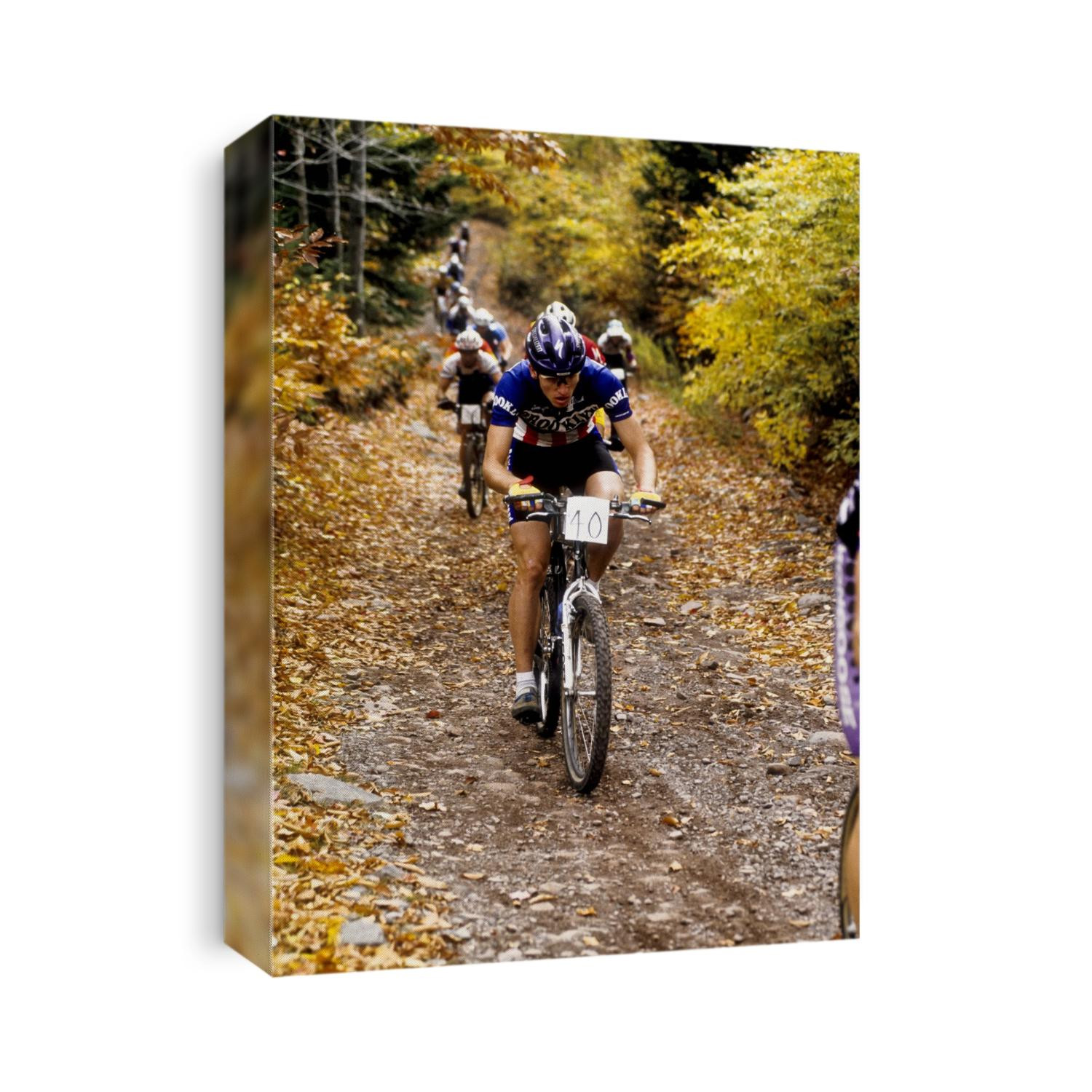 Male mountain biker competing in a race. 1993 NY State Champpnships.