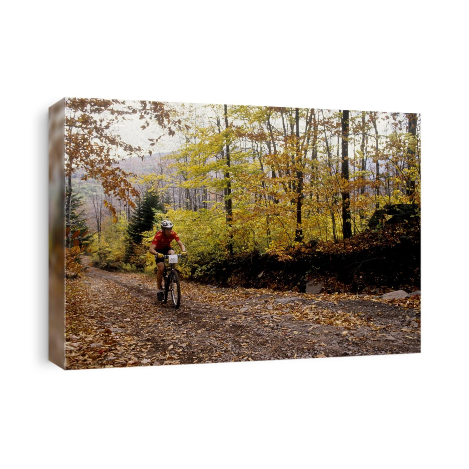 Male mountain biker competing in a race. 1993 NY State Champpnships.