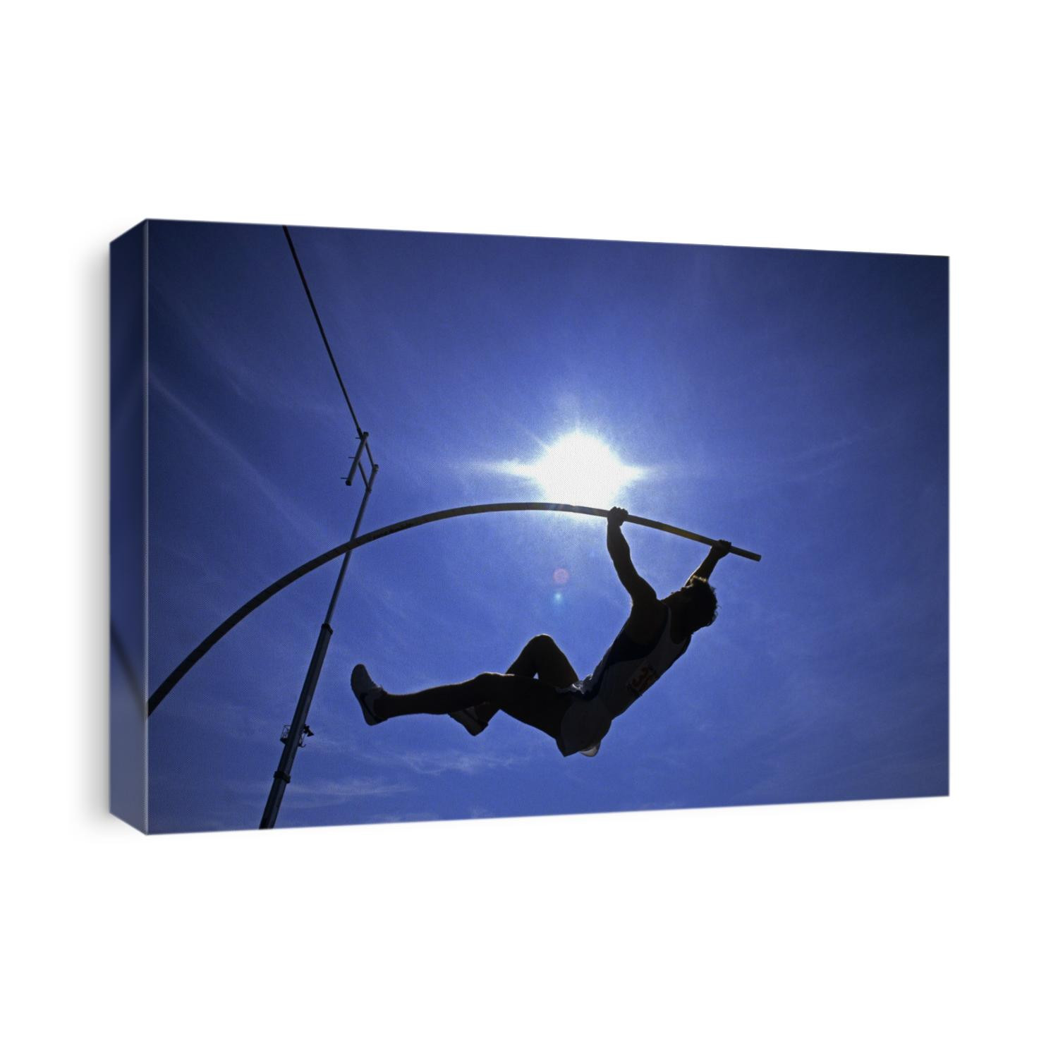 Silhouette of male pole vaulter.