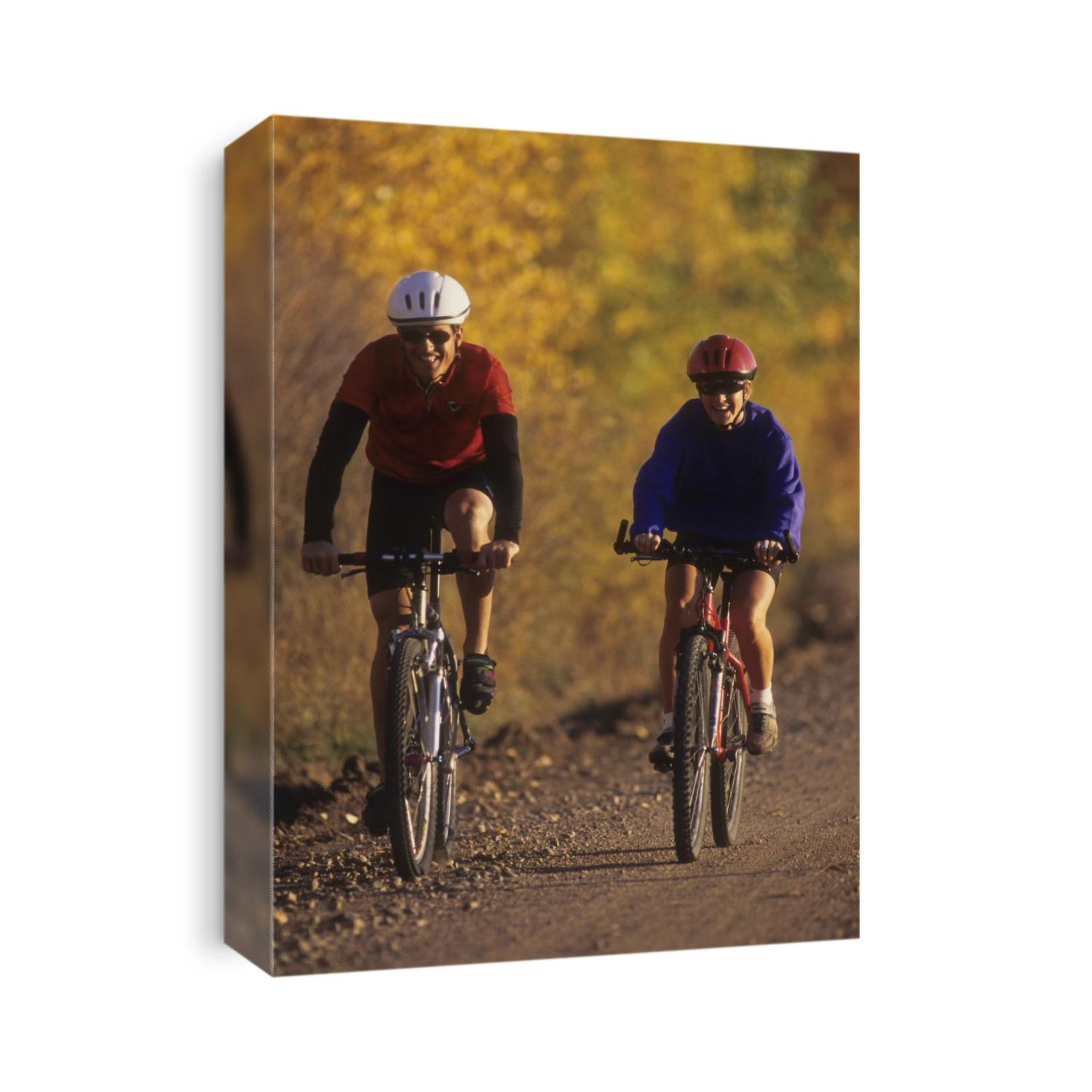 Couple mountain biking in Fall.