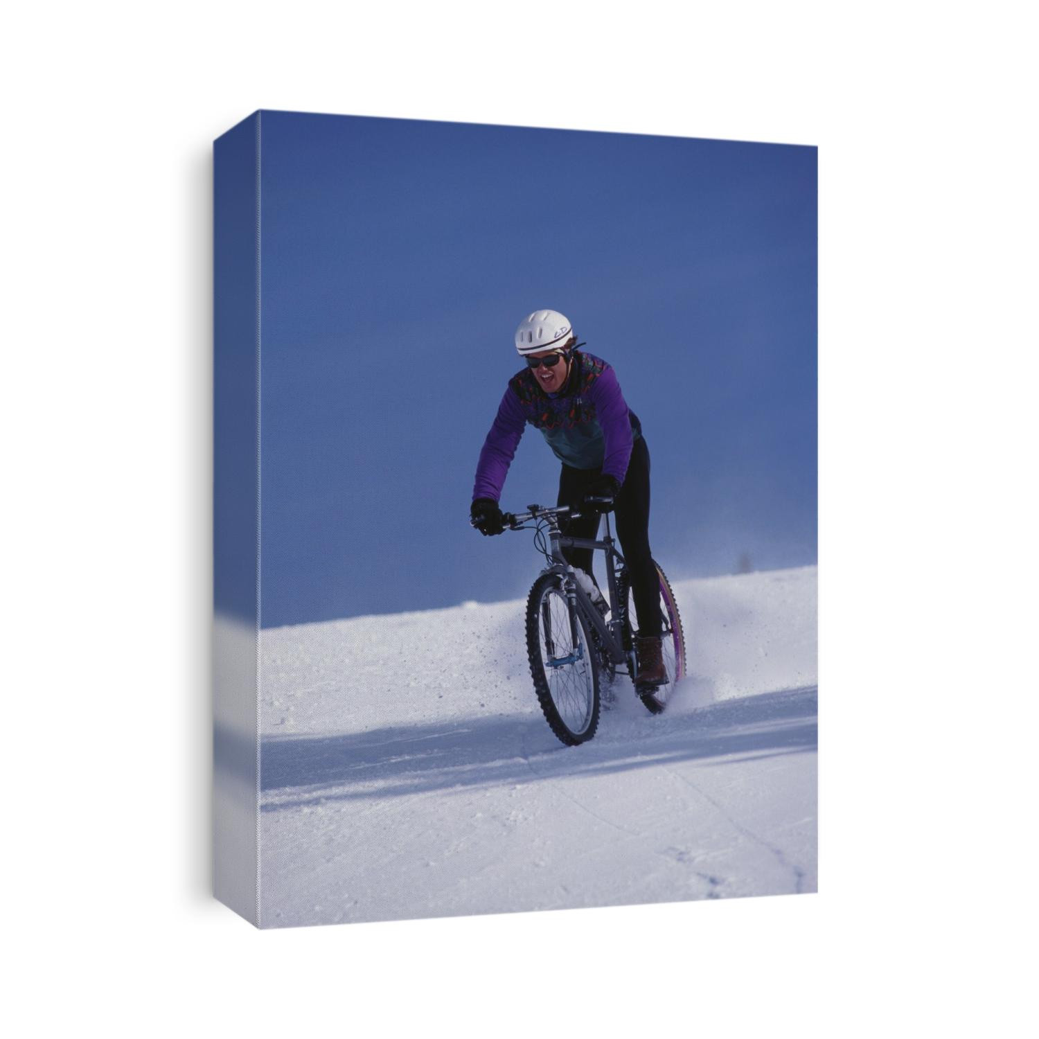 Mountain biking on snow.