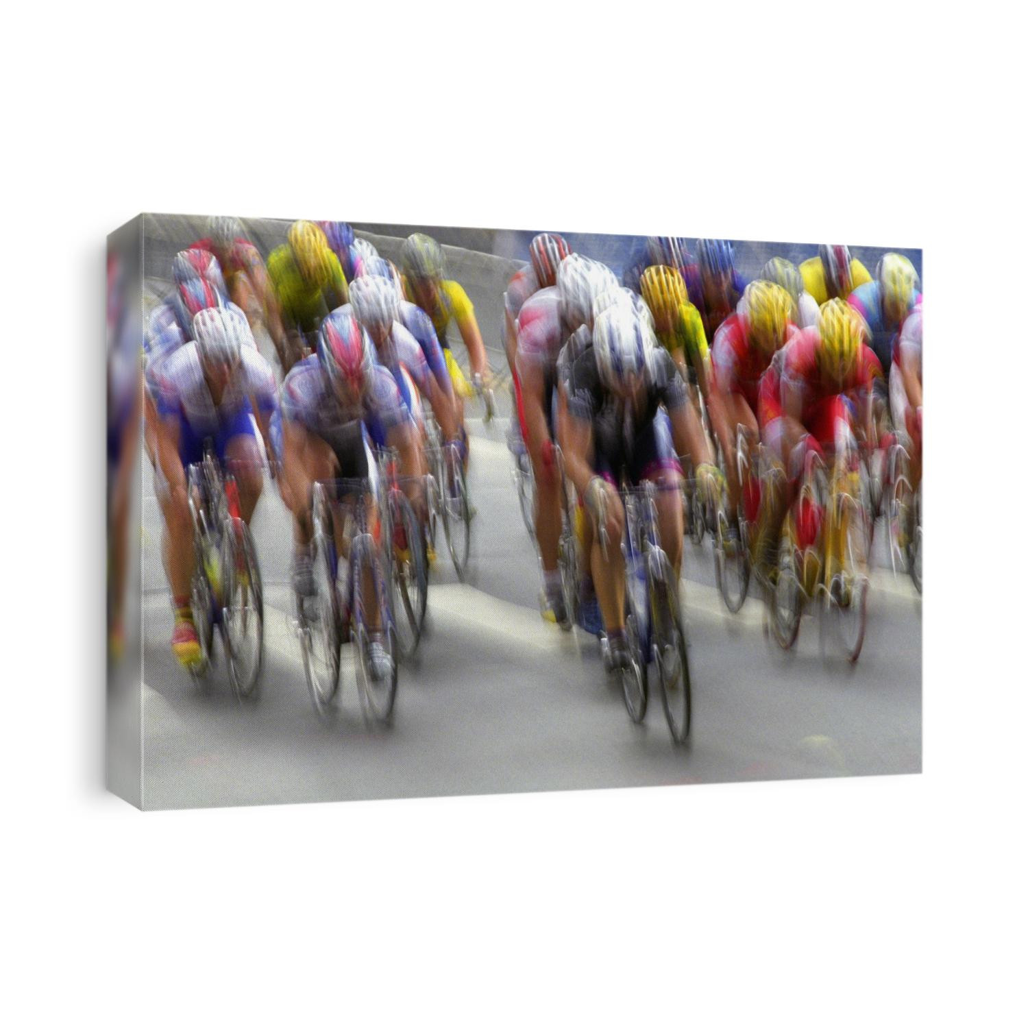 Blured action of road cylcling competition.