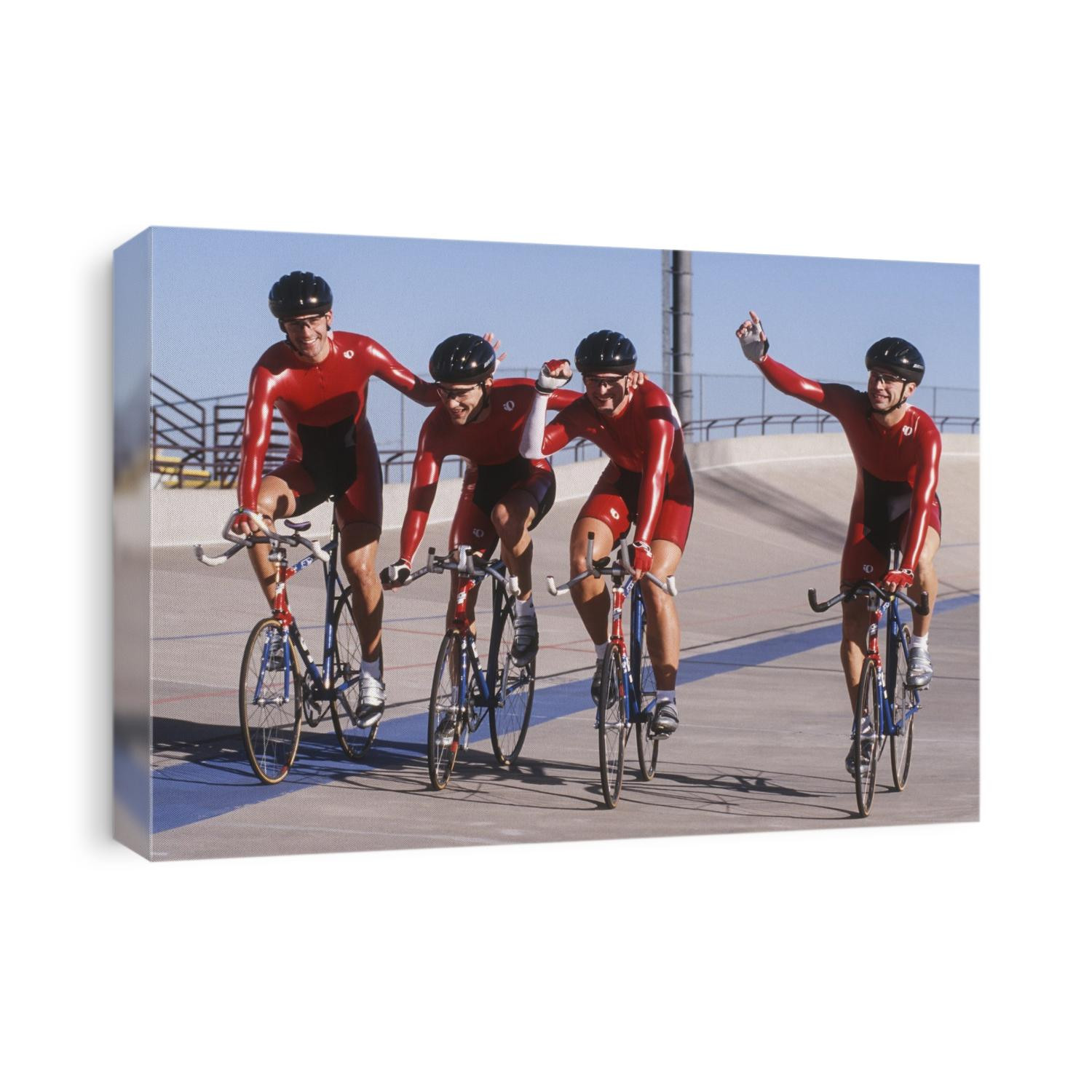 Male cycling team on the velodrome.