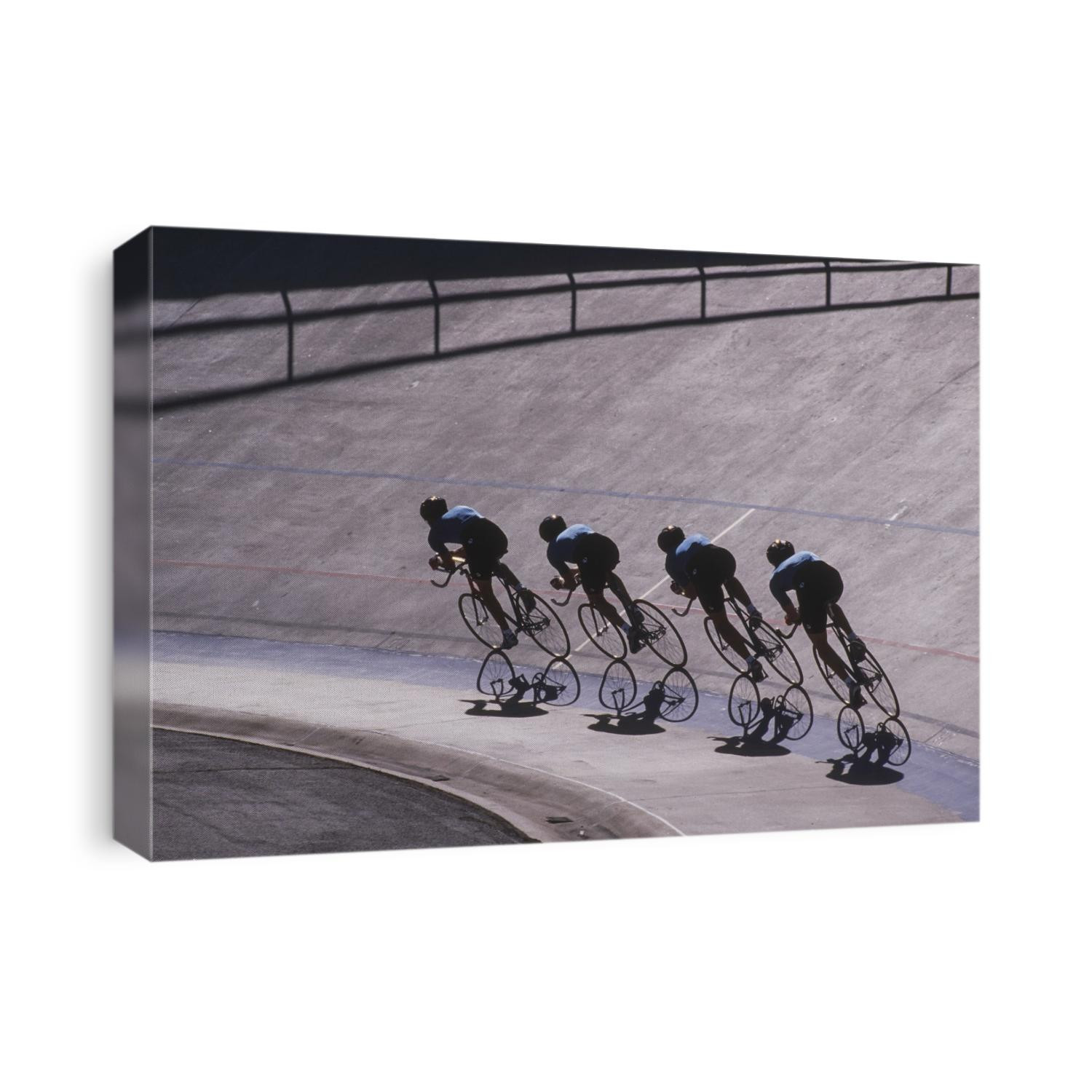 Male cycling team on the velodrome.
