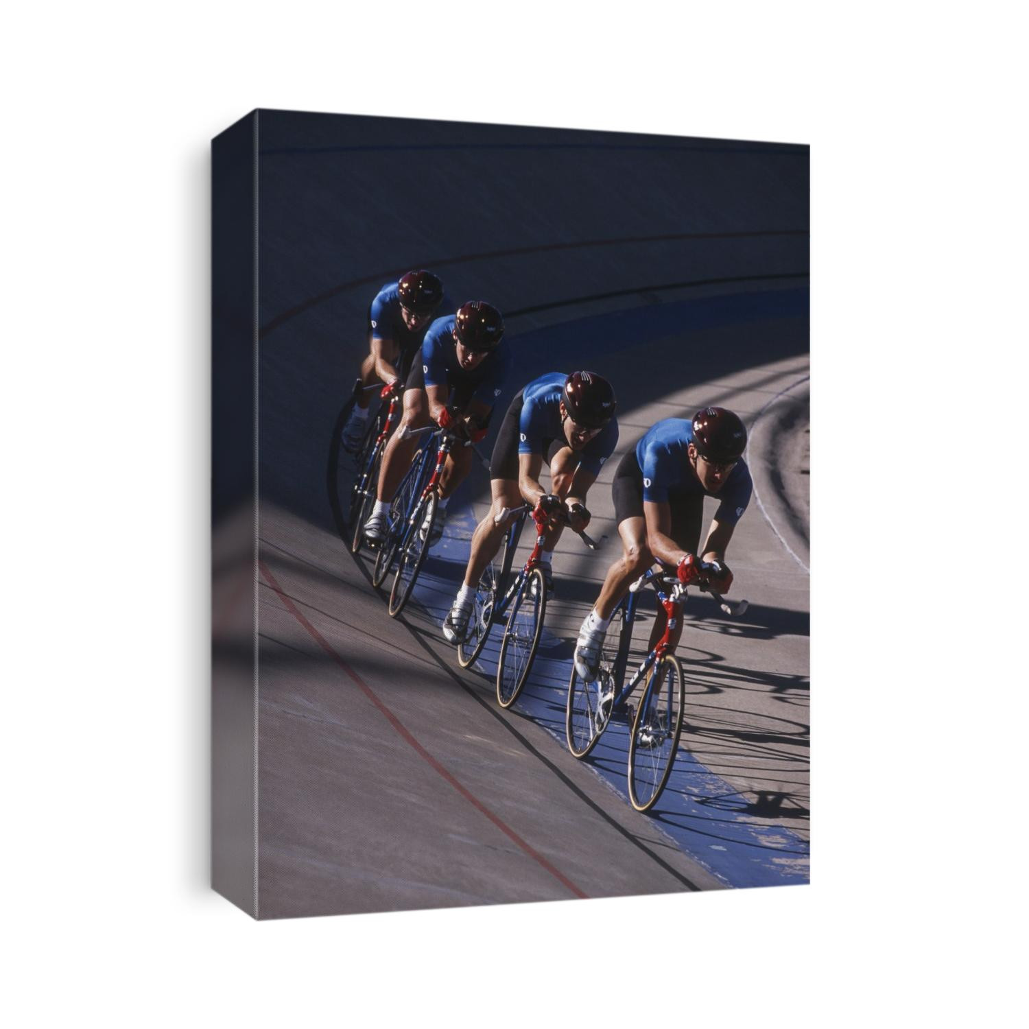 Male cycling team on the velodrome.