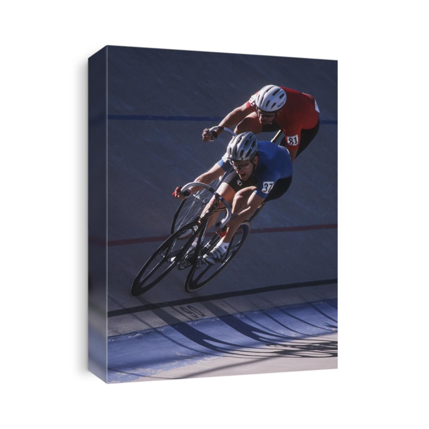 Male cyclists competing on the veledrome.