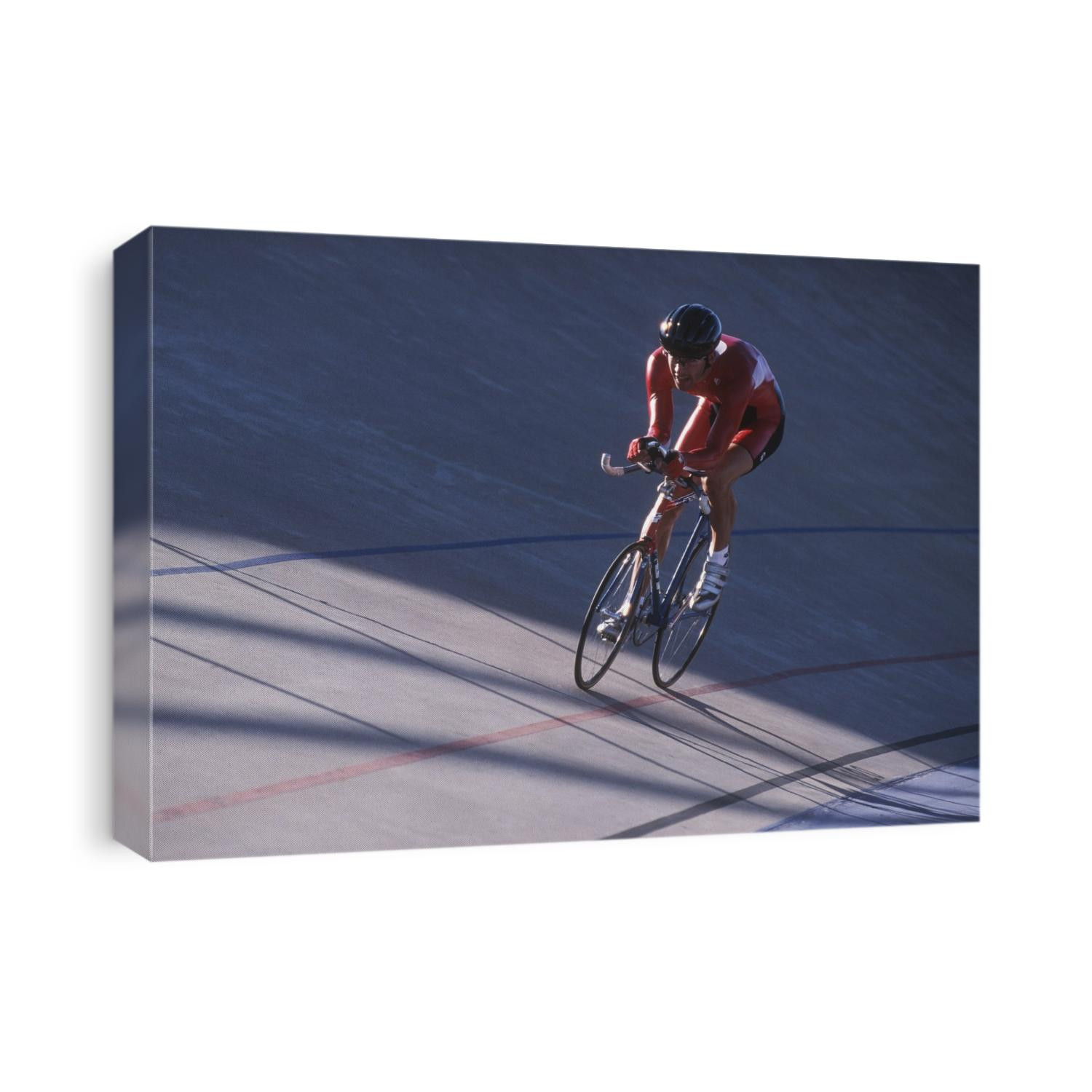 Male cyclist competing on the velodrome.