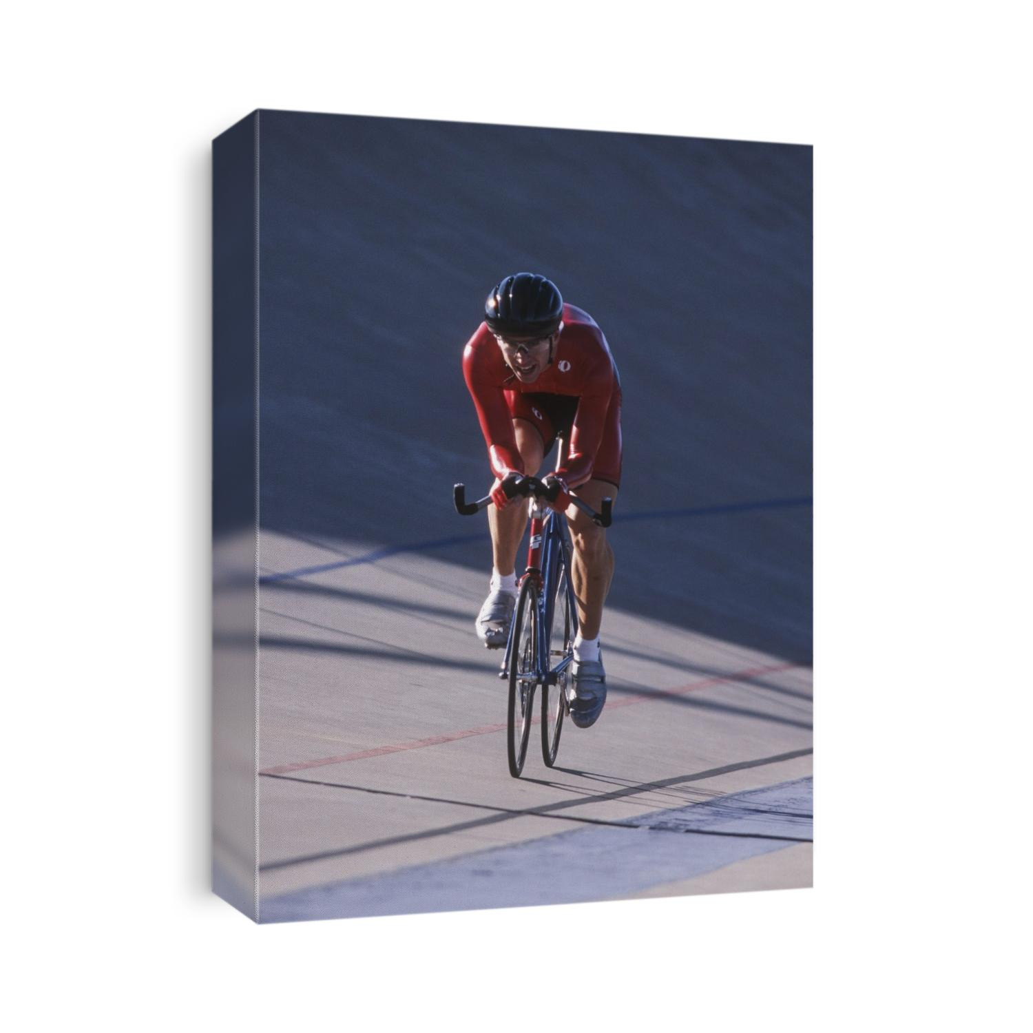 Male cyclist competing on the velodrome.