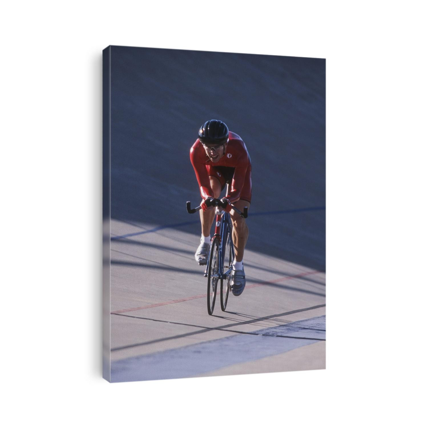 Male cyclist competing on the velodrome.