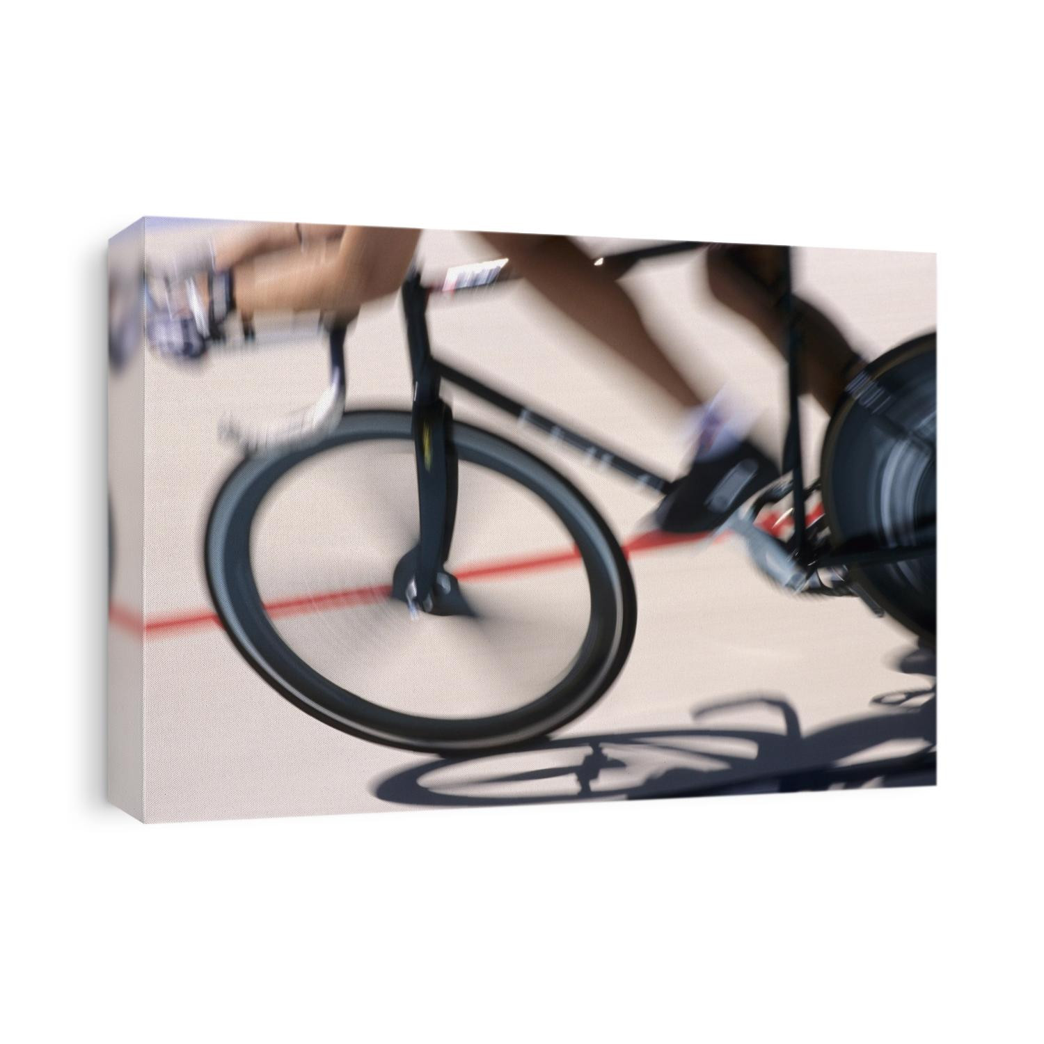 Detail of blured action of cyclist competing on the velodrome.
