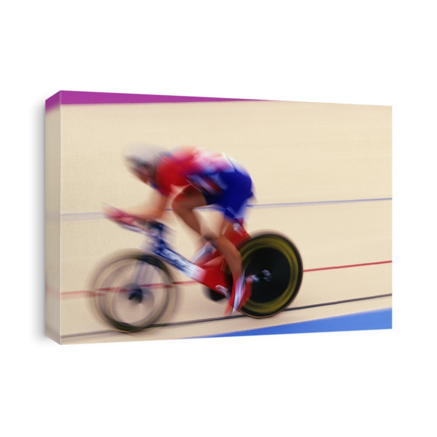 Blurred action of cyclist on the track.
