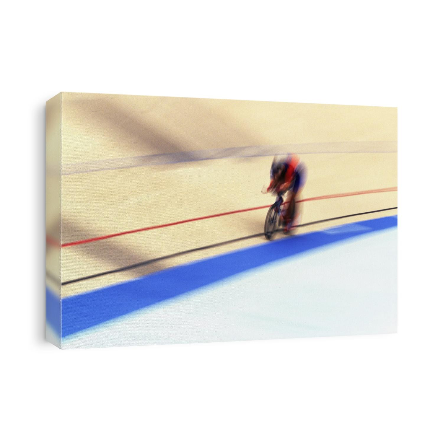 Blurred action of cyclist on the track.